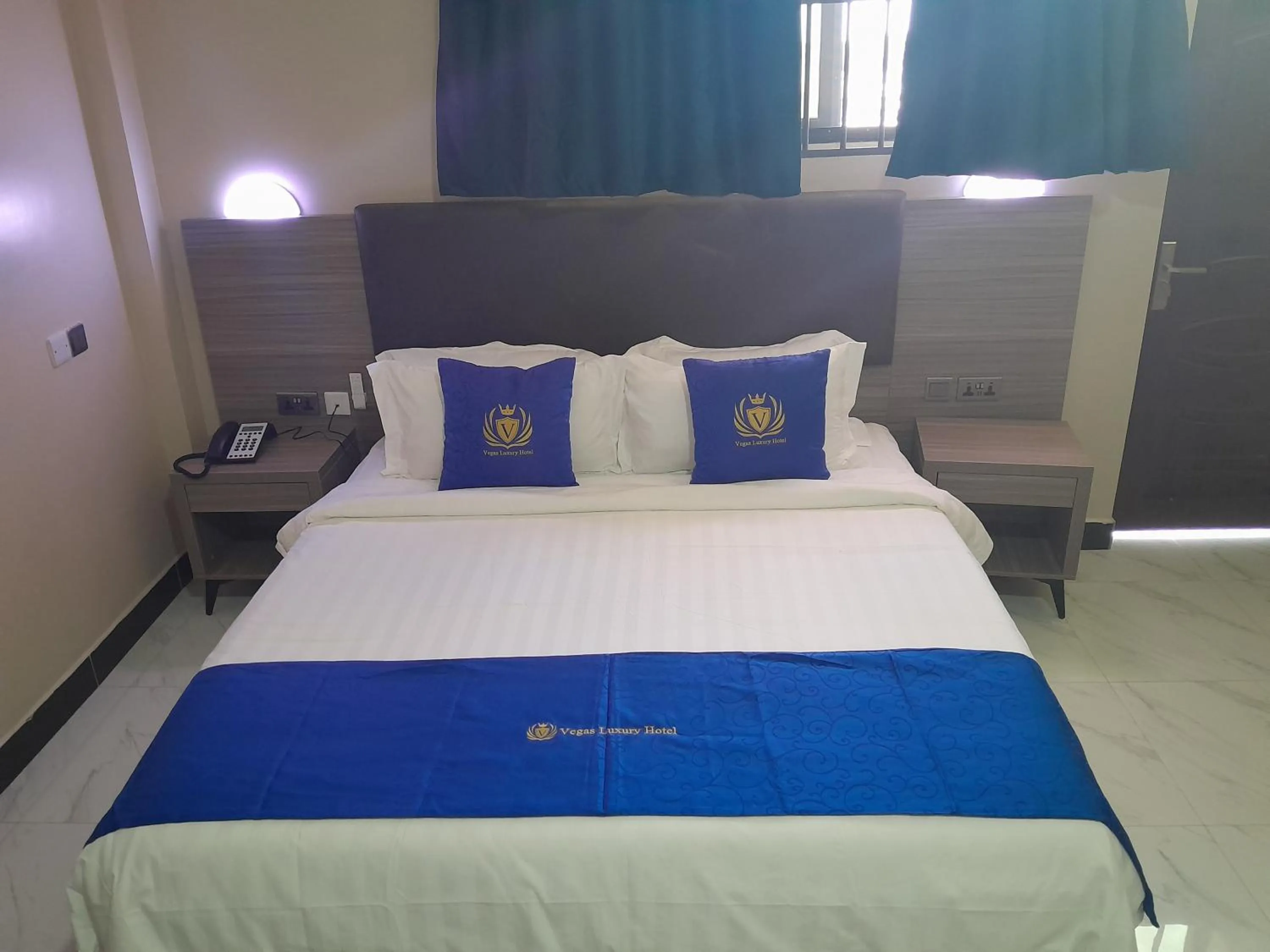 Bed in VEGAS LUXURY HOTEL