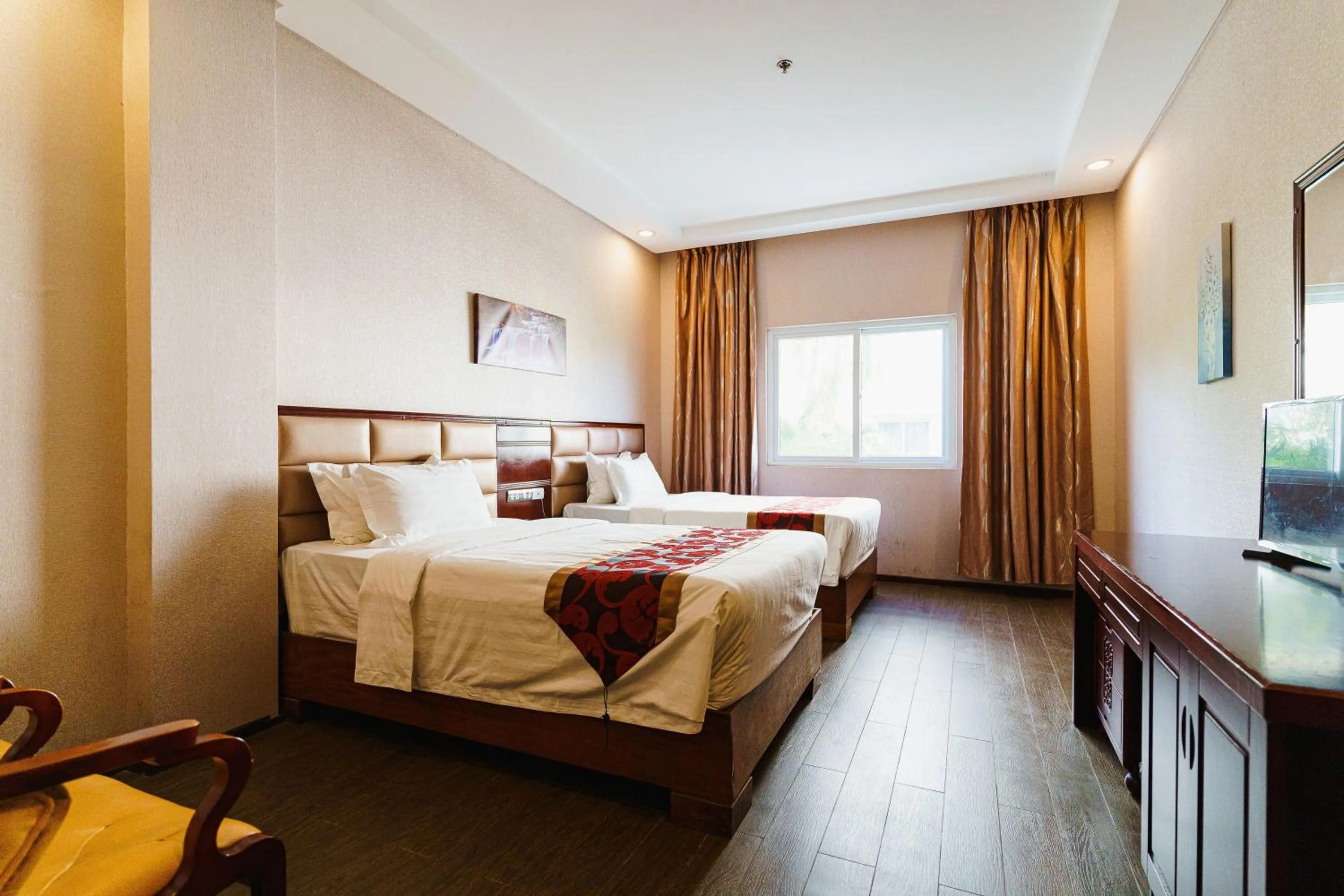 Bed in Palawan Uno Hotel