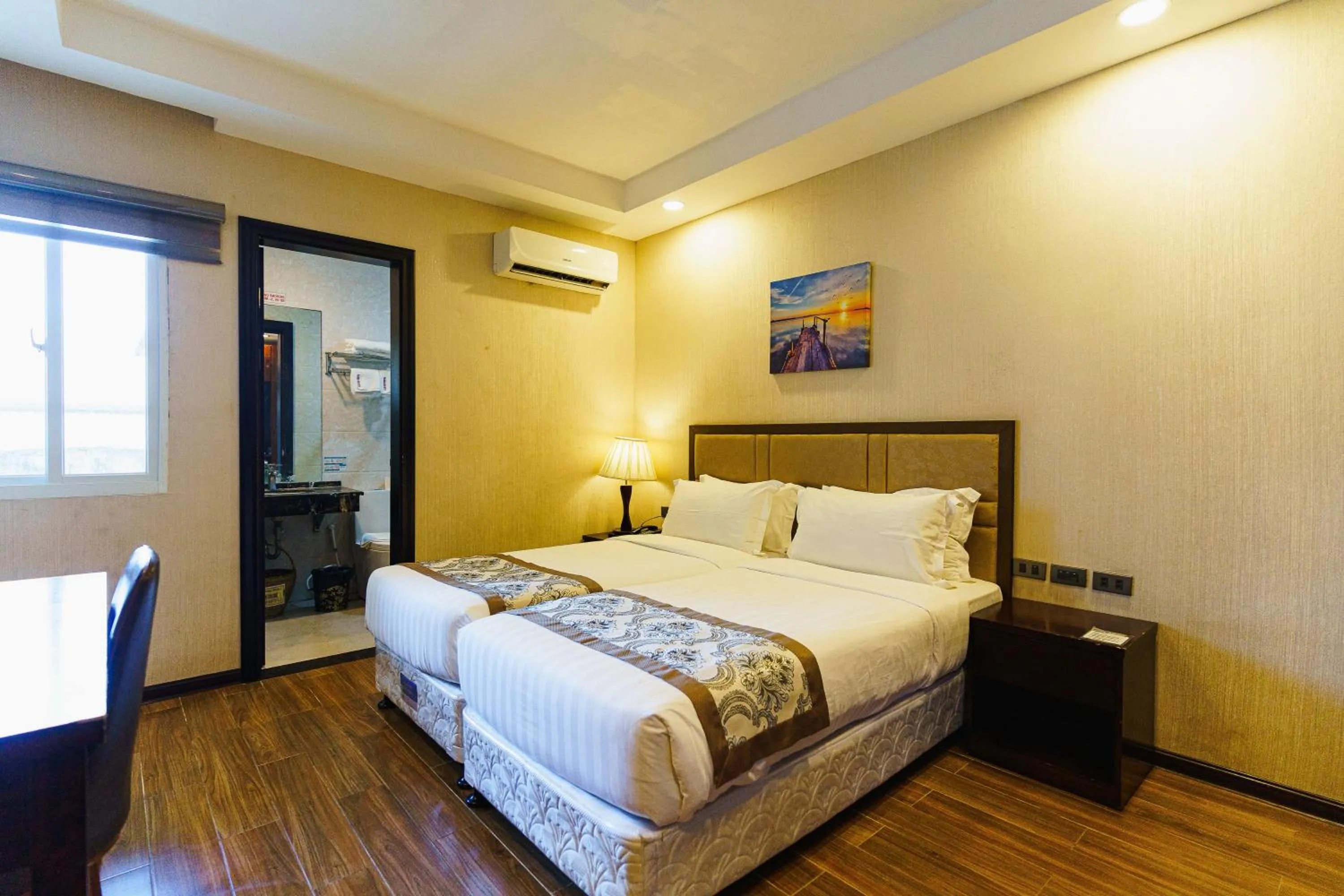 Bed in Palawan Uno Hotel