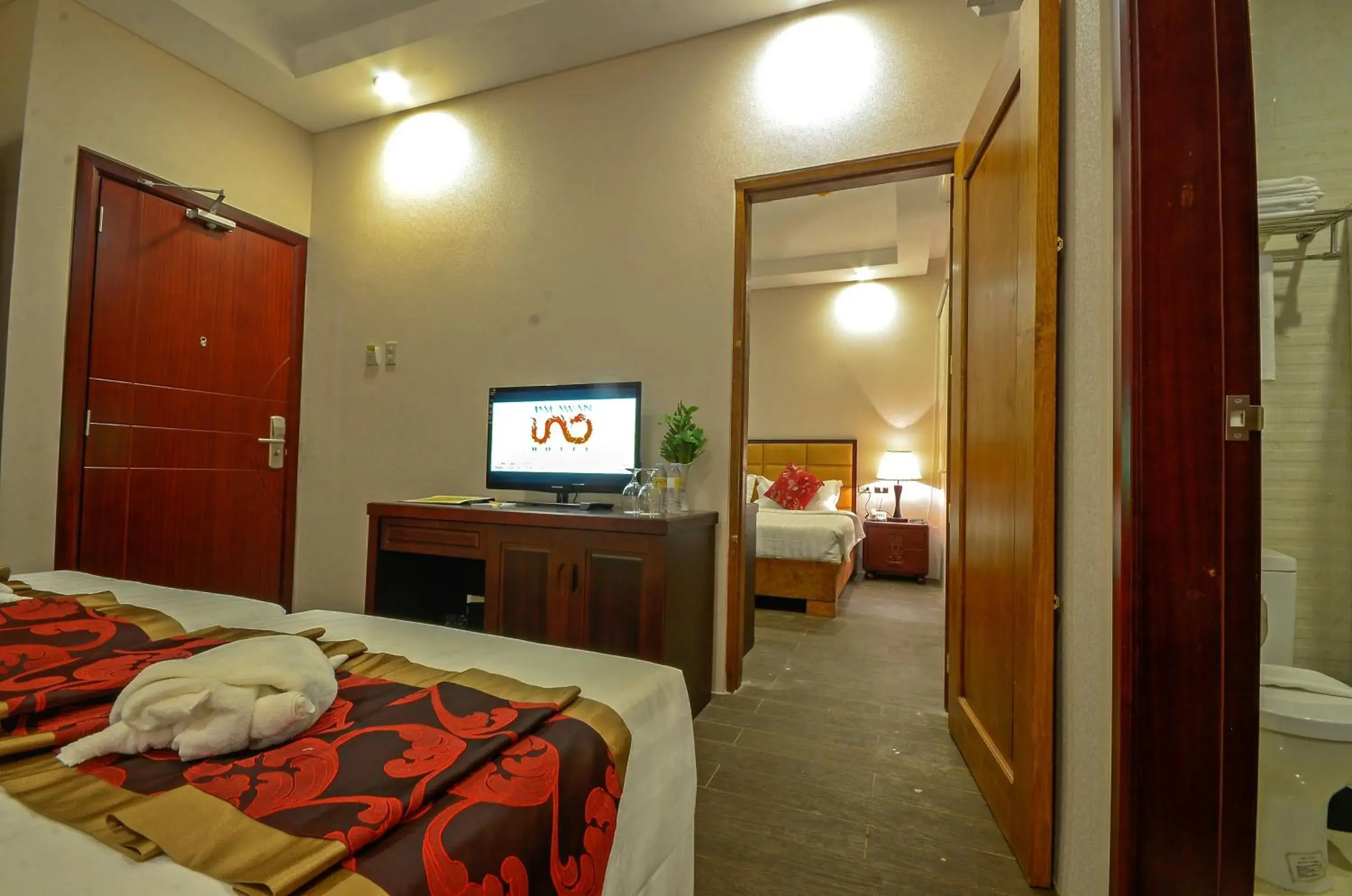 Family Adjoining Room in Palawan Uno Hotel Family Adjoining Room in Palawan Uno Hotel