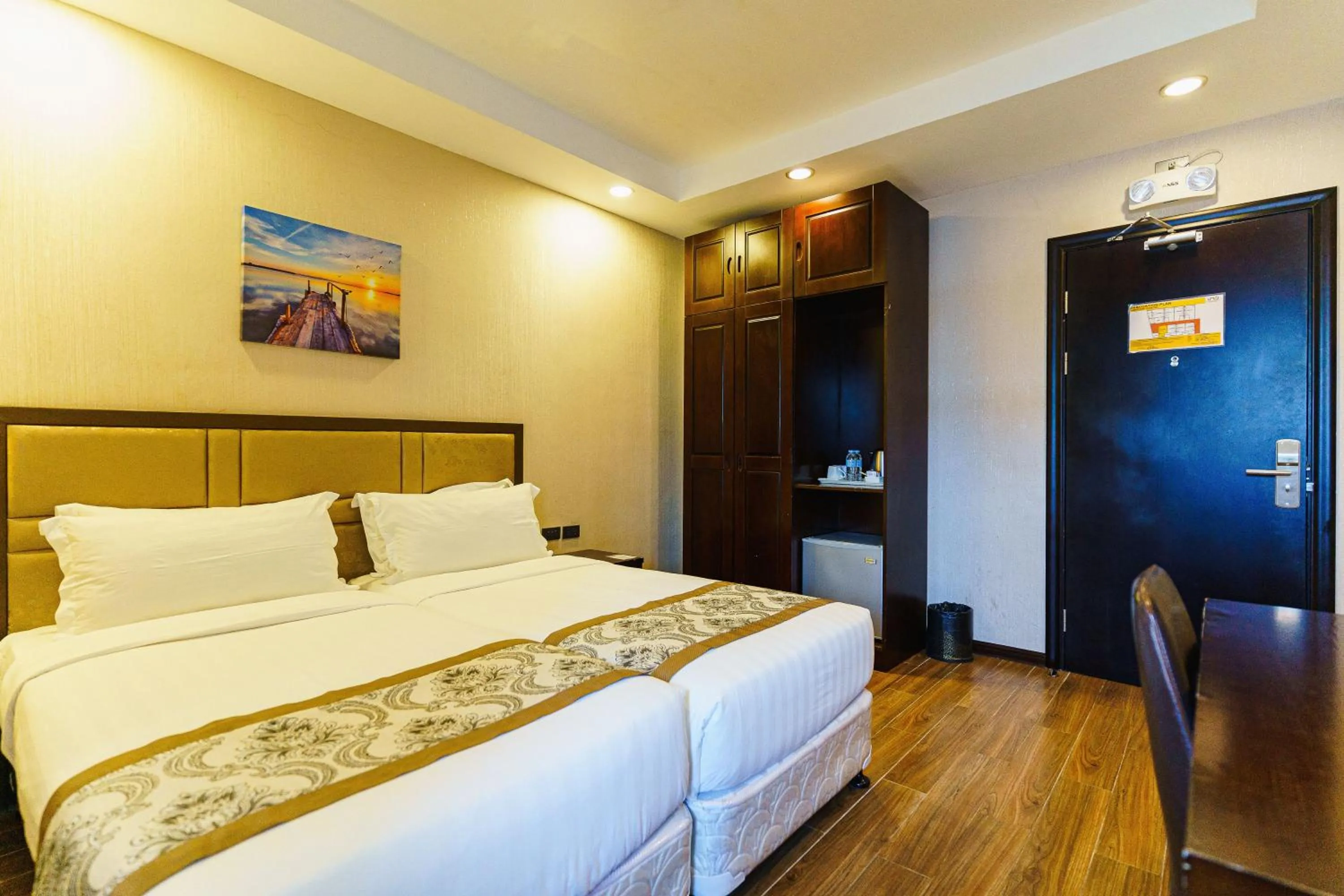 Bed in Palawan Uno Hotel