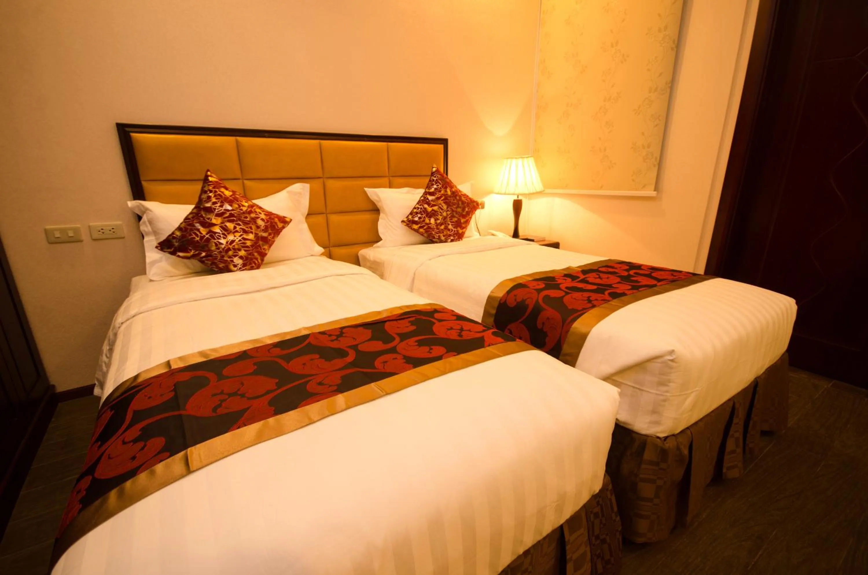 Photo of the whole room, Bed in Palawan Uno Hotel