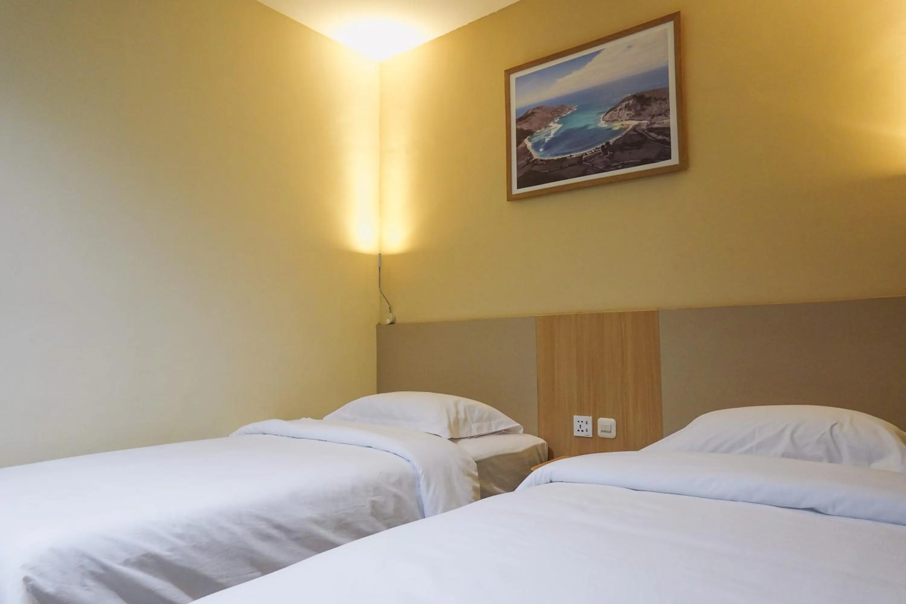 Bed in City Hotel Mataram