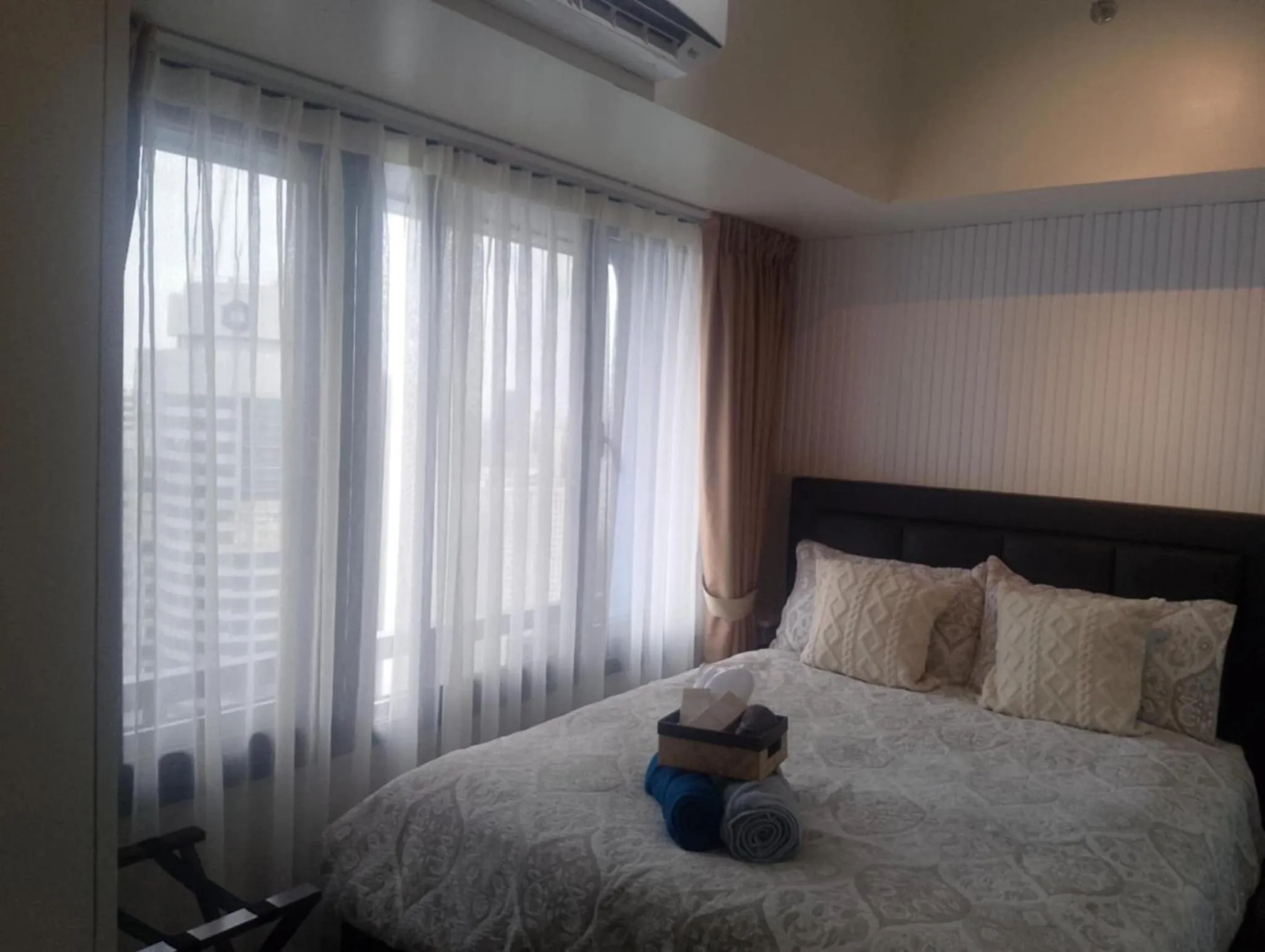 Bedroom, Bed in E & T Homecations 2 Bedroom Apartment at SMDC Air Residences