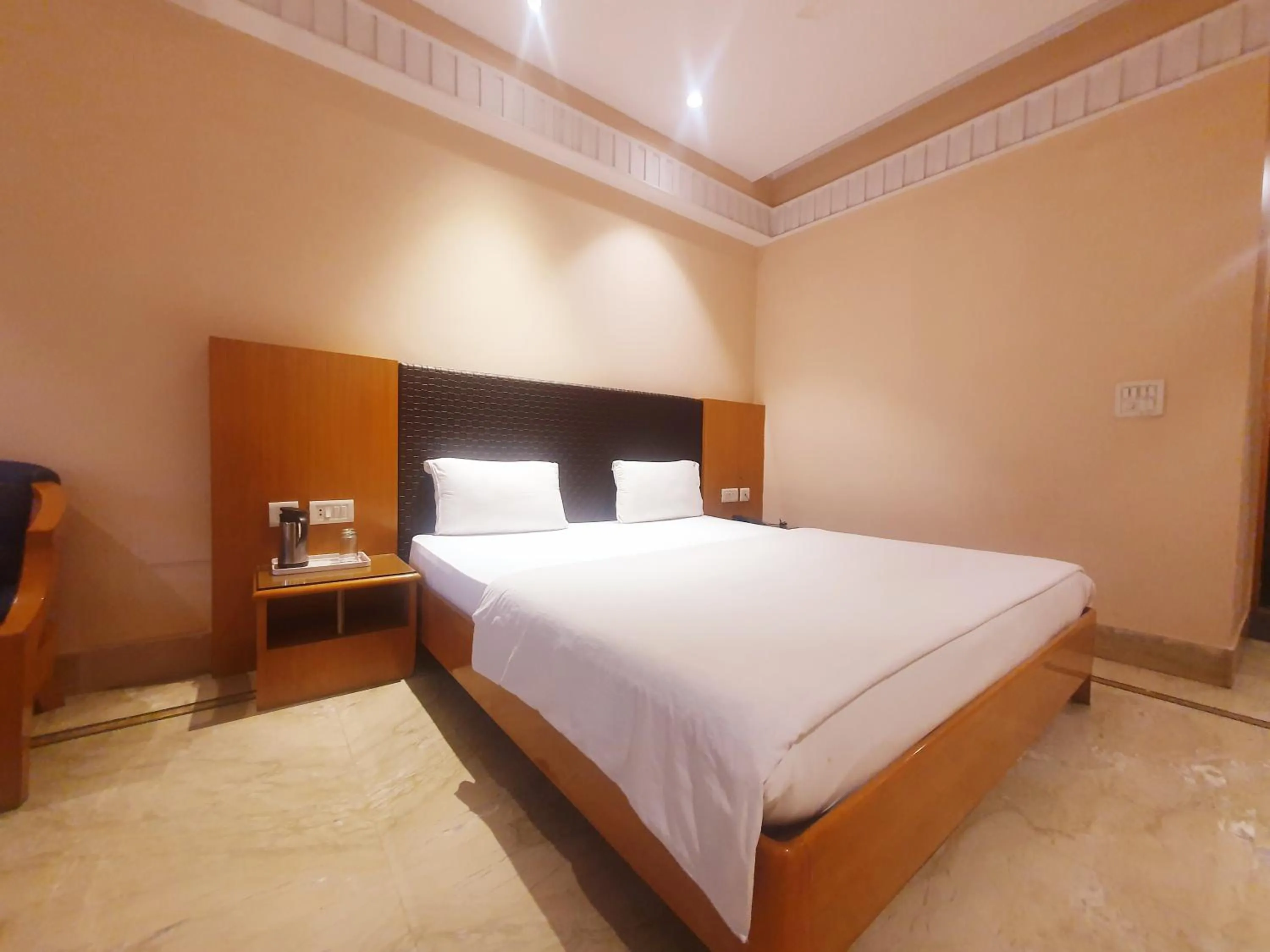 Bed in Hotel Shrinath Palace