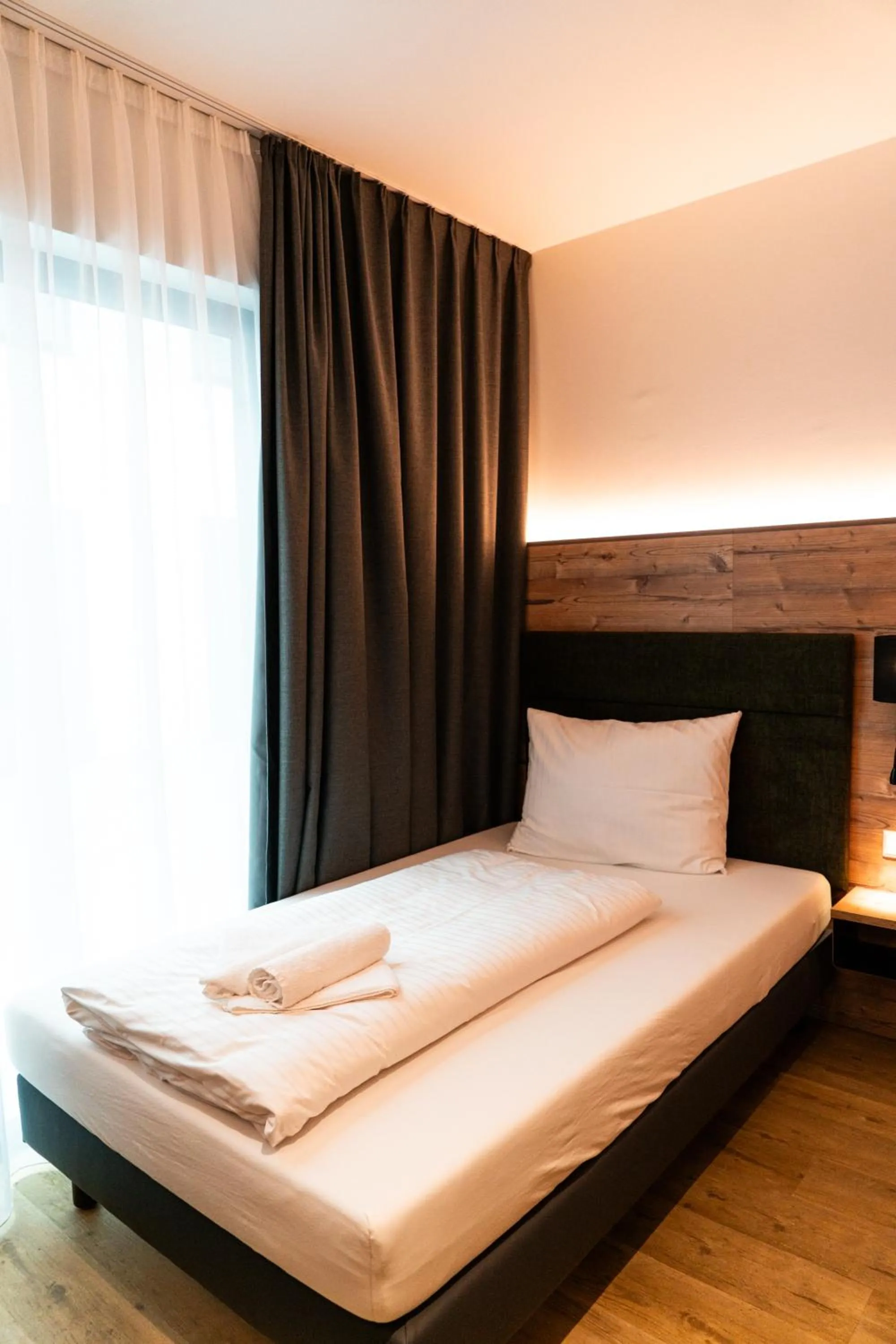 Bed in SEKRA Stadthotel