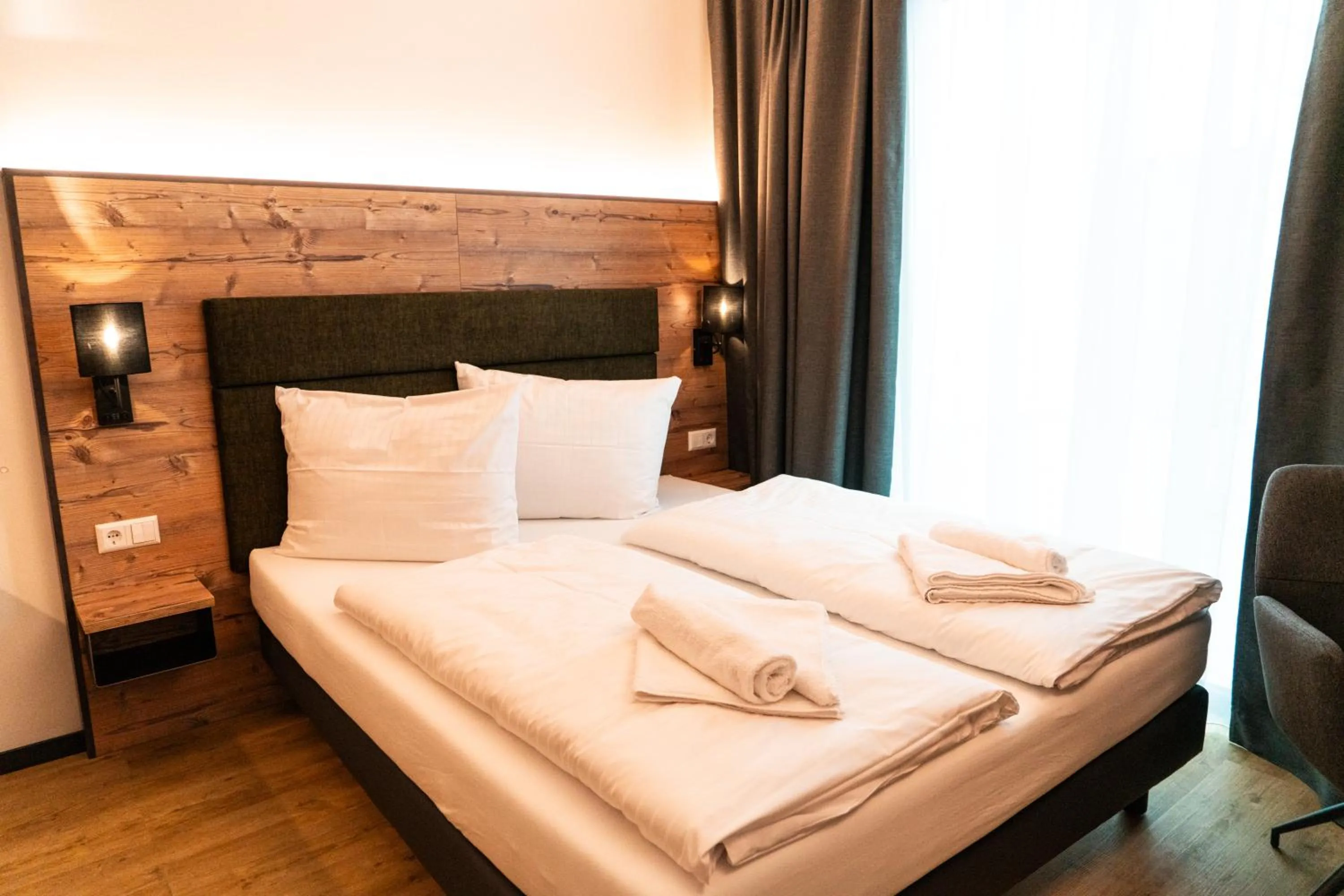 Bed in SEKRA Stadthotel