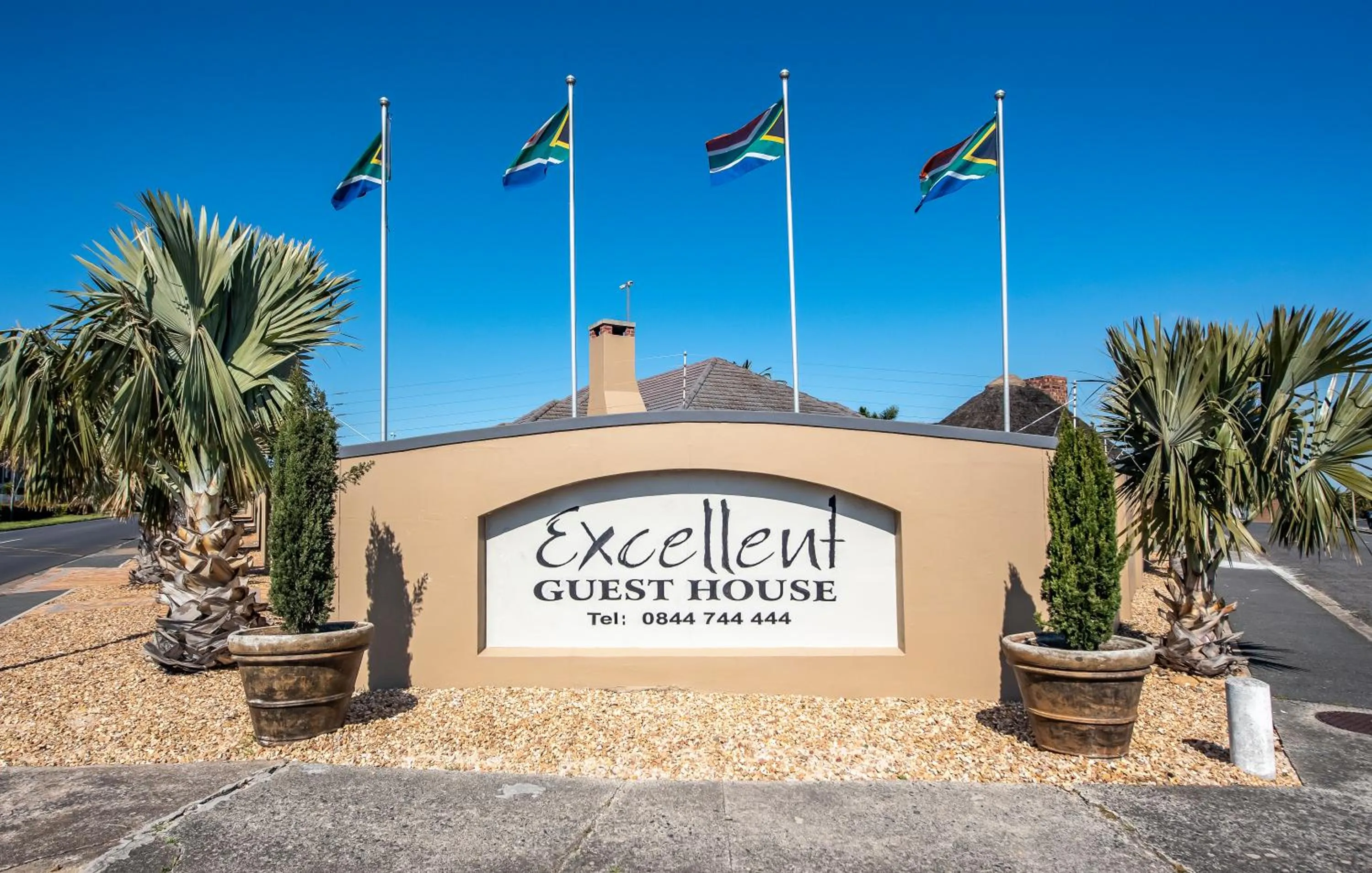 Property logo or sign in Excellent Guest House