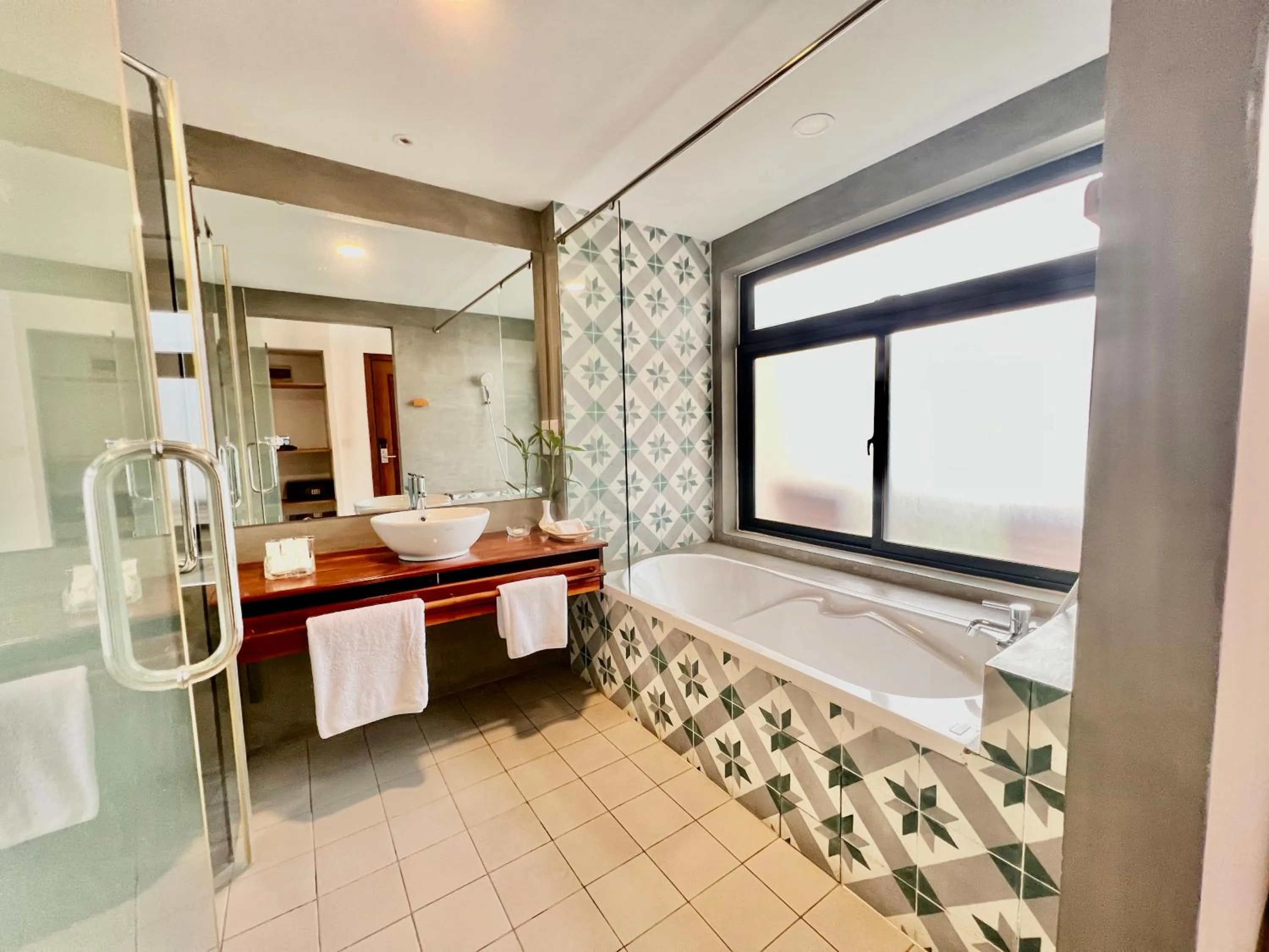 Bathroom in DACO Hotel
