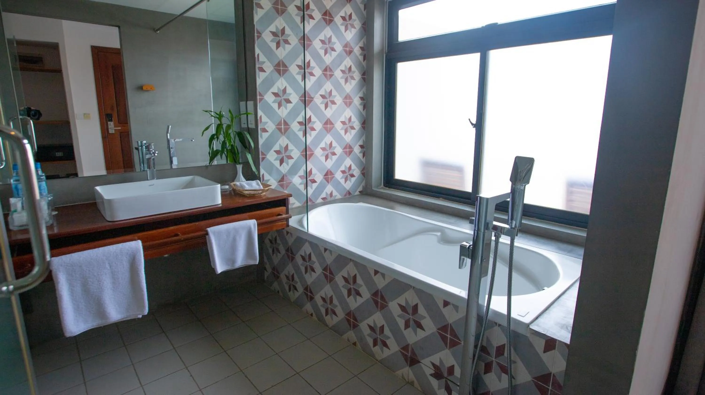 Bathroom in DACO Hotel