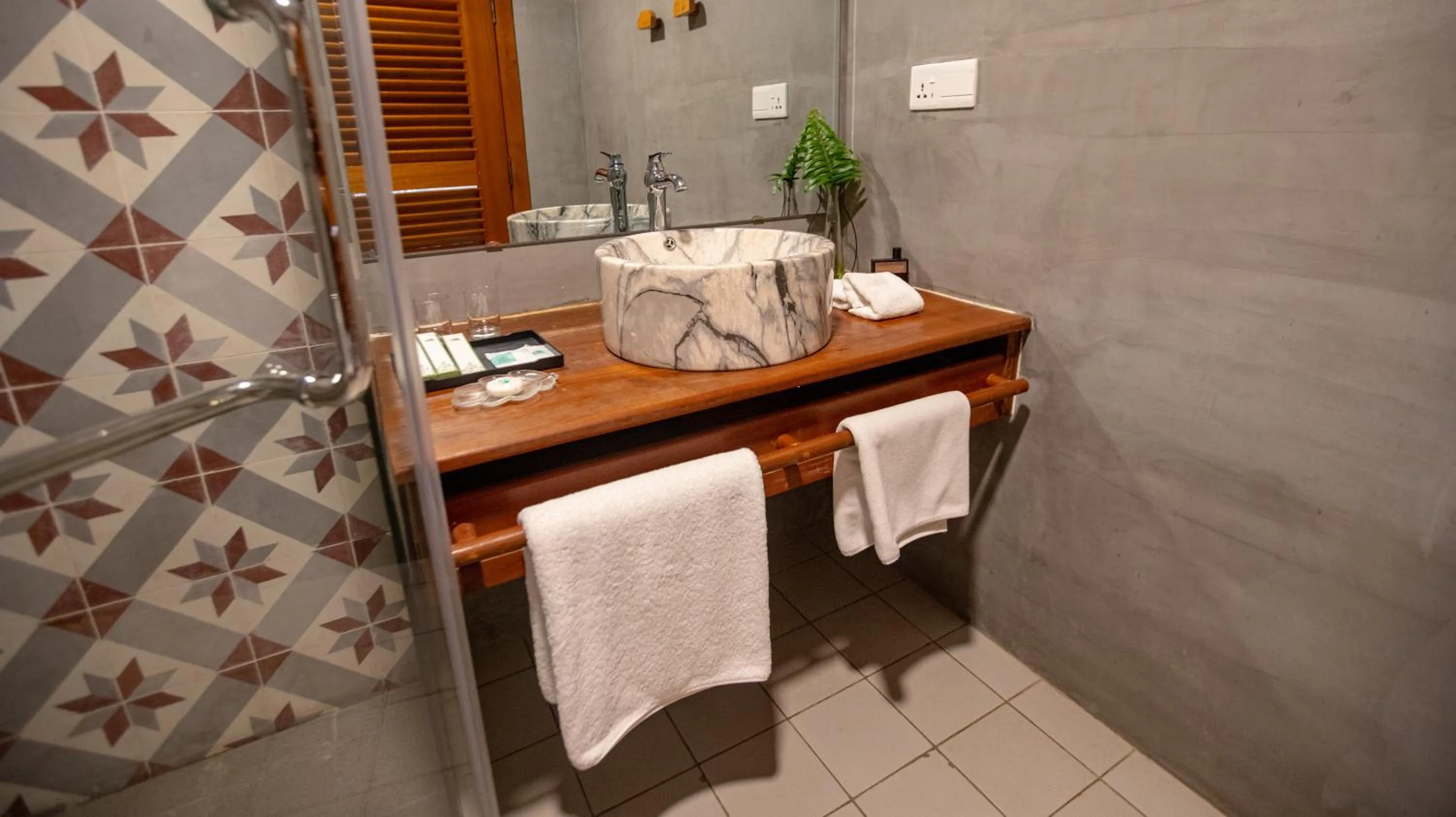 Bathroom in DACO Hotel