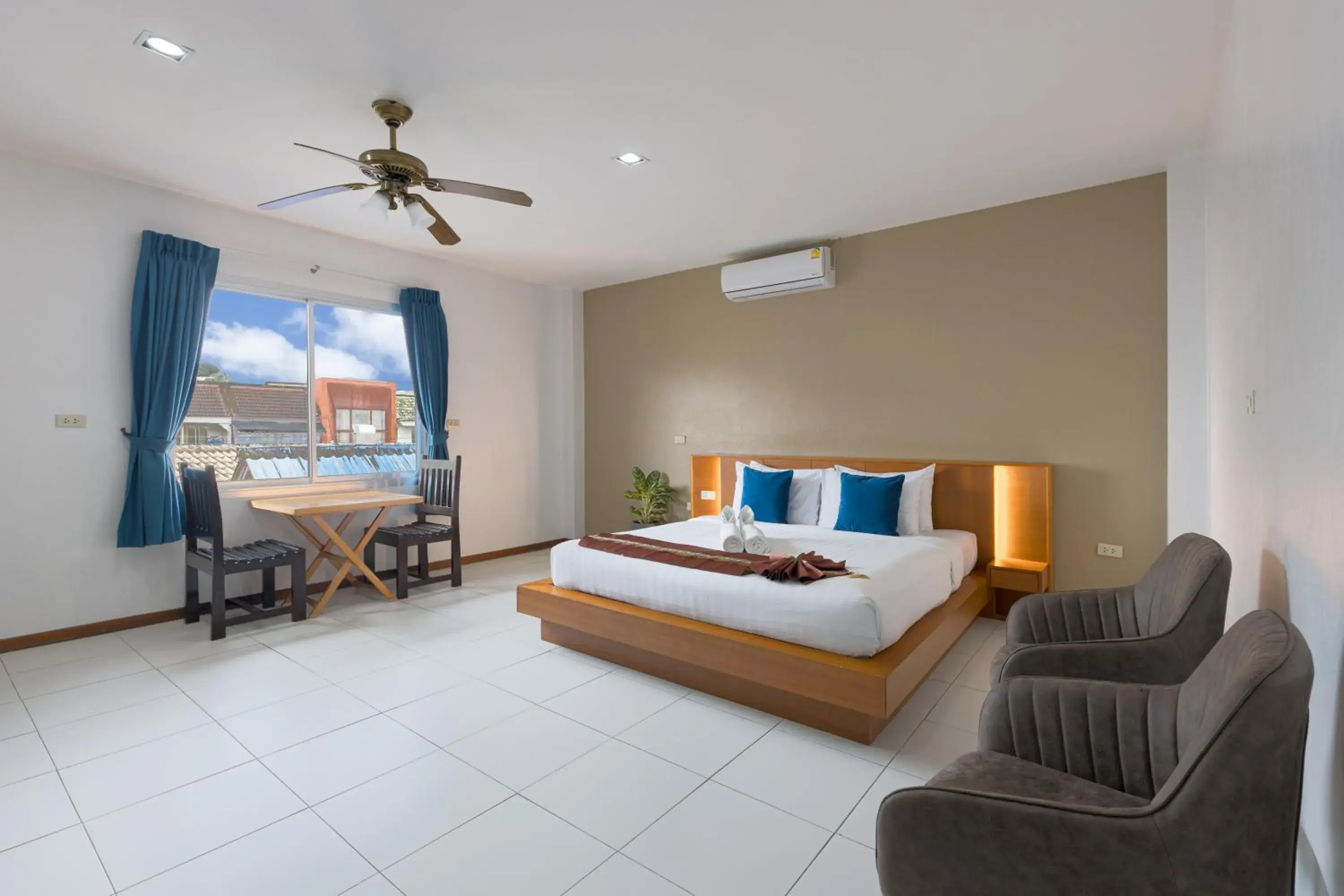 Quadruple Room with Balcony in Blue Palm Kata Resort Quadruple Room with Balcony in Blue Palm Kata Resort