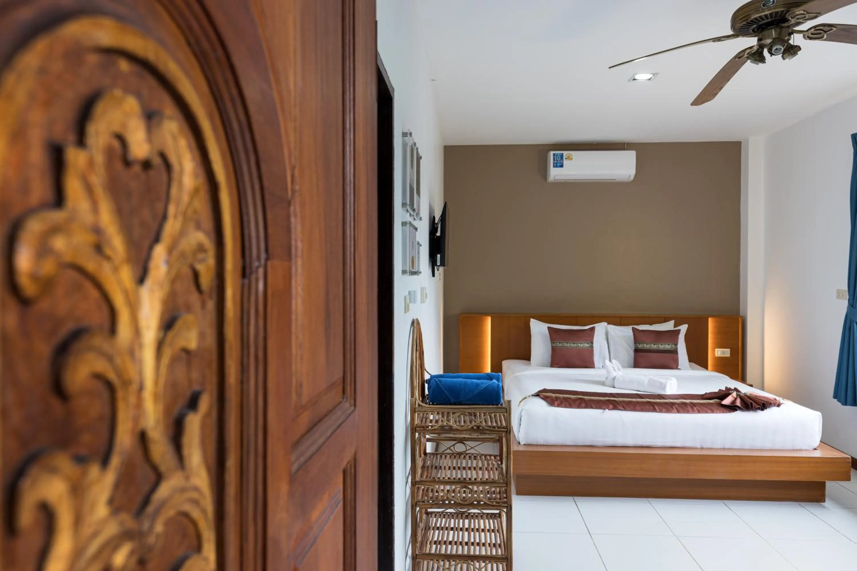 Bed in Blue Palm Kata Resort