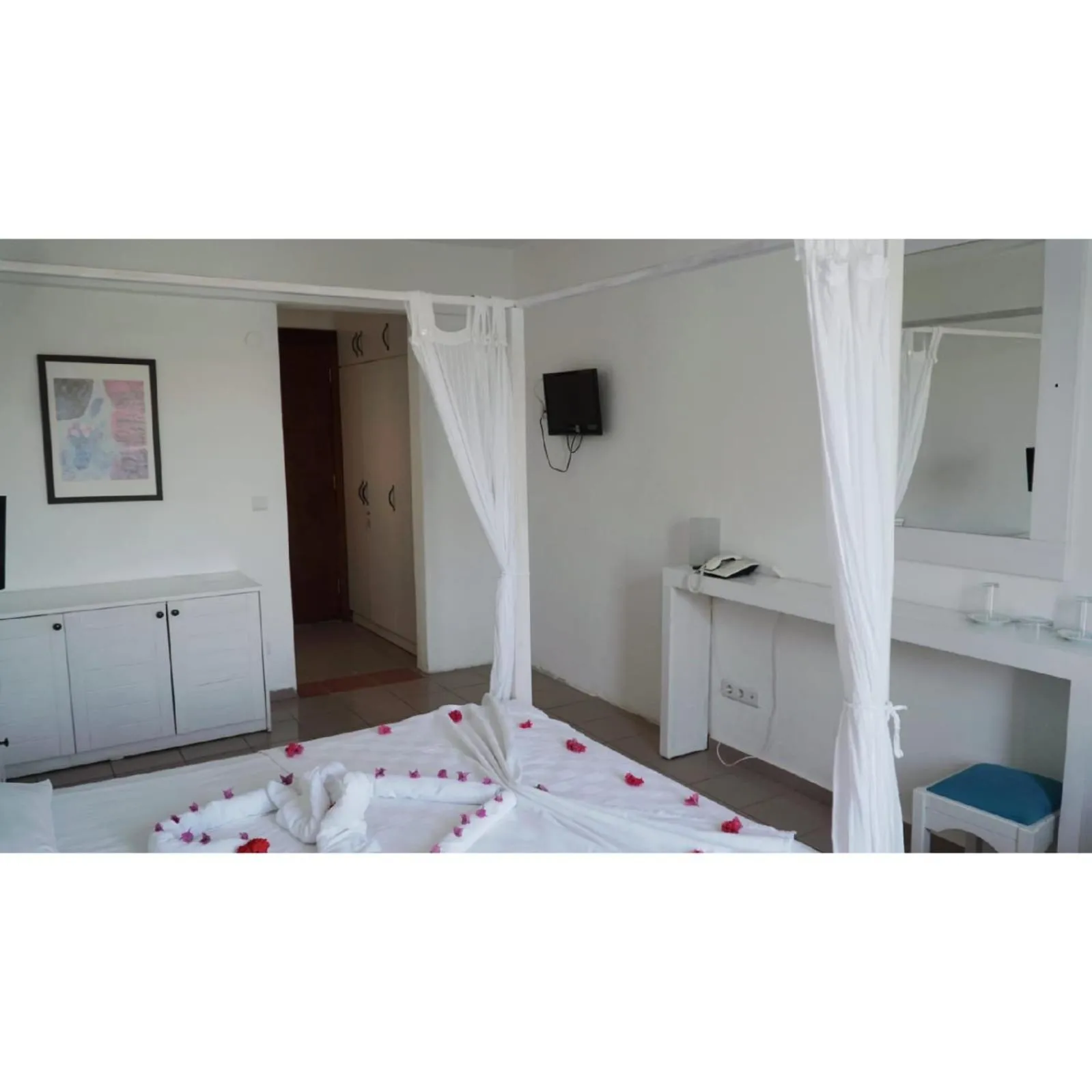 Bed in Gumbet Cove Hotel