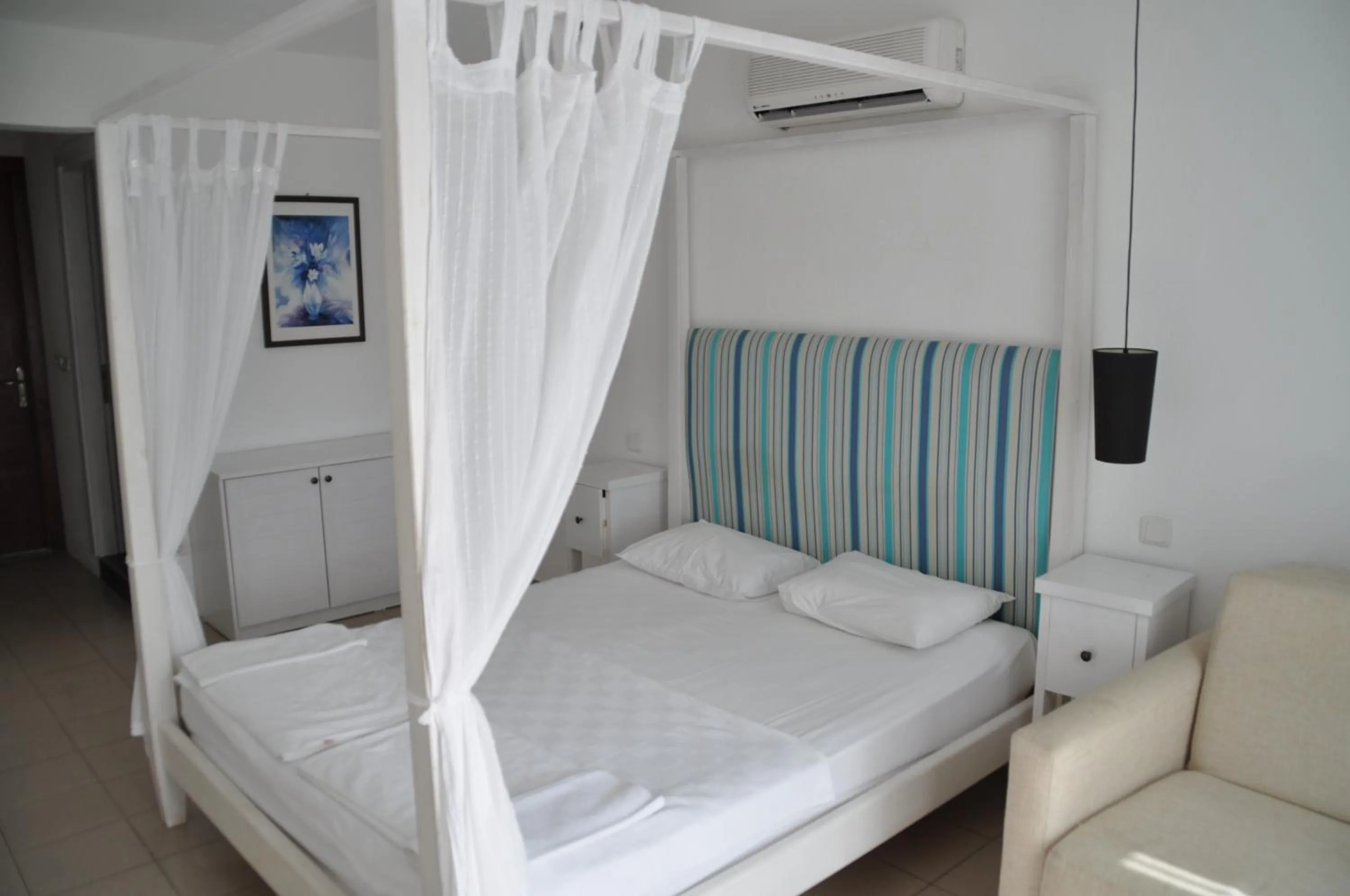 Bed in Gumbet Cove Hotel