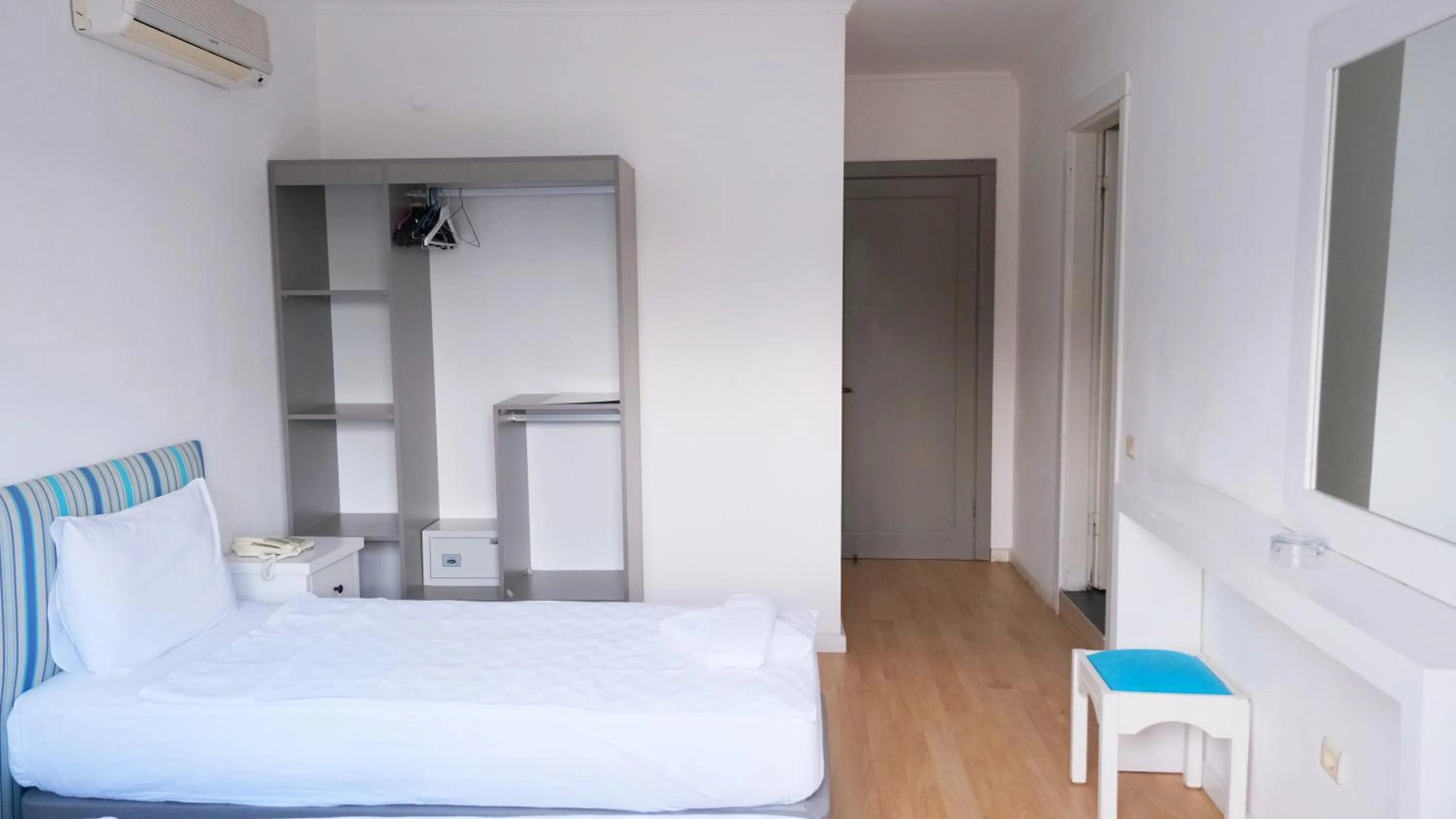 Bed in Gumbet Cove Hotel