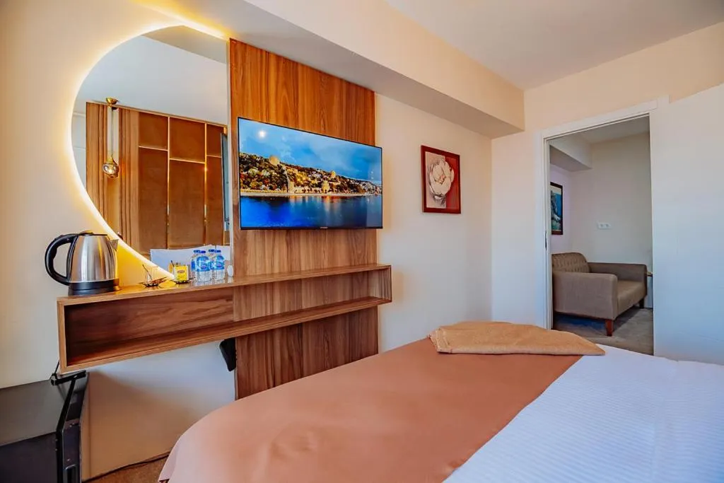 Bed in Ali Khan Hotel