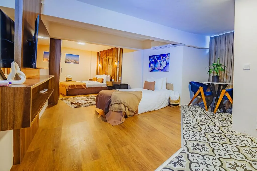 Bed in Ali Khan Hotel