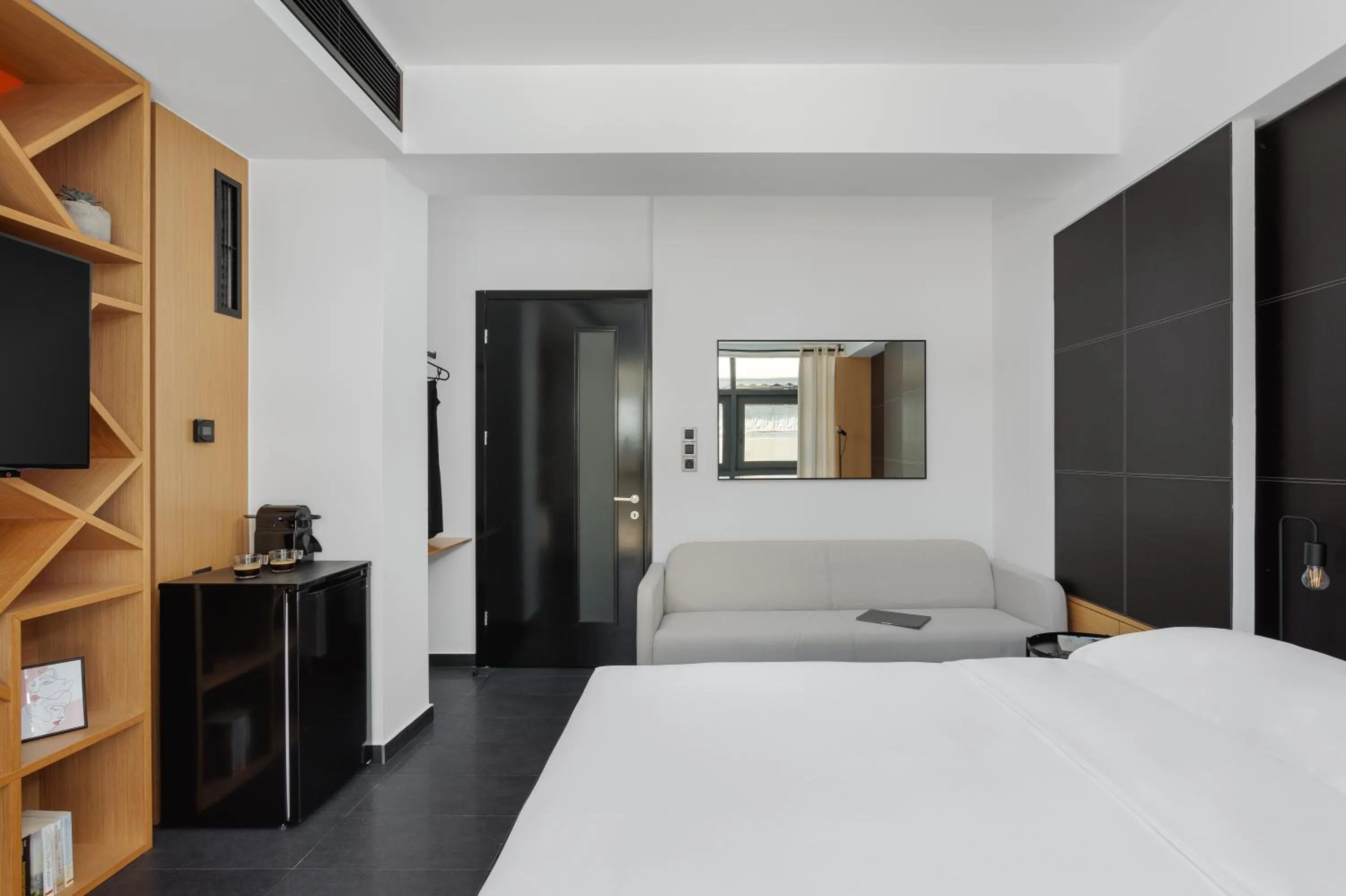 Photo of the whole room, Bed in THE URBANIST •inner city residences•