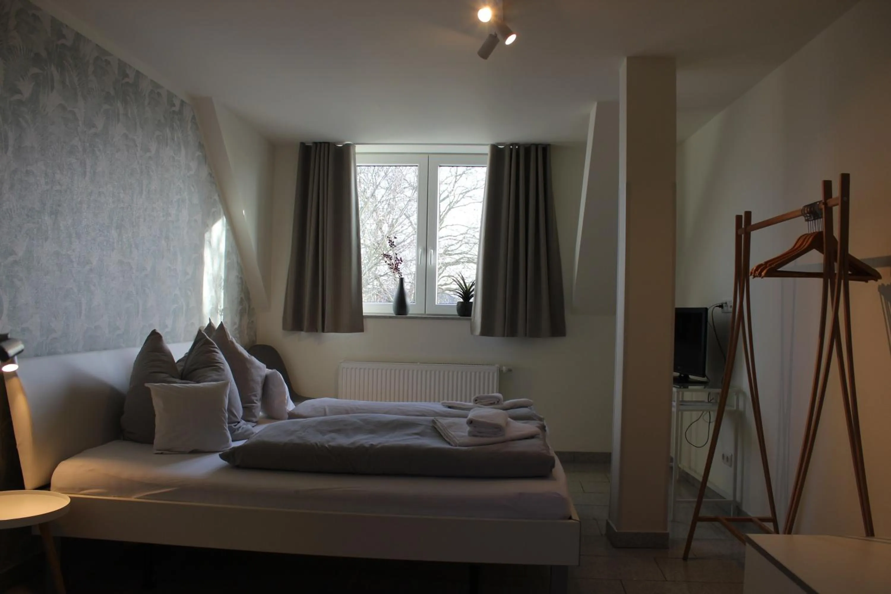 Photo of the whole room, Bed in Schwanenhof Hotel und Restaurant