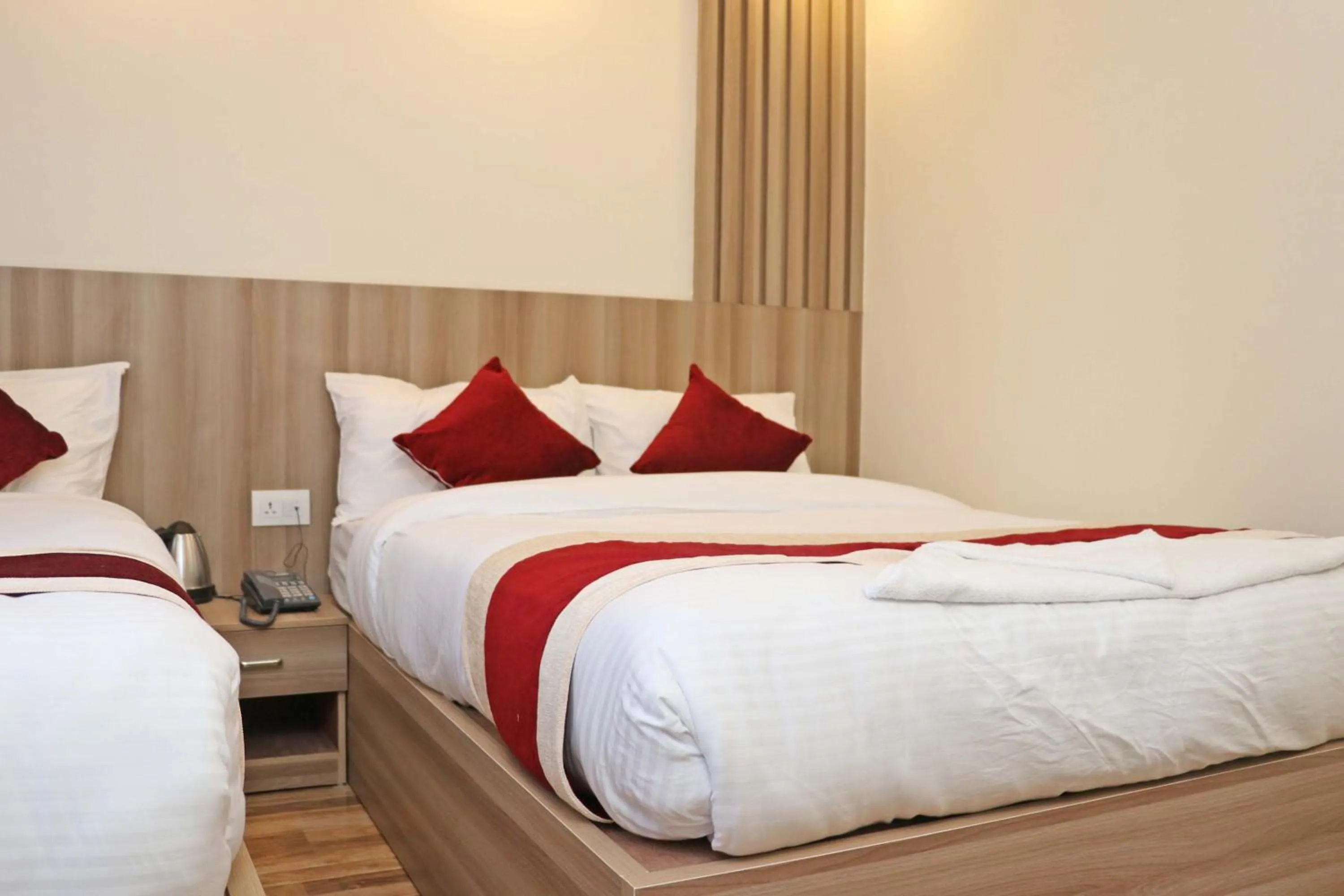 Bed in Hotel Royal Emperor