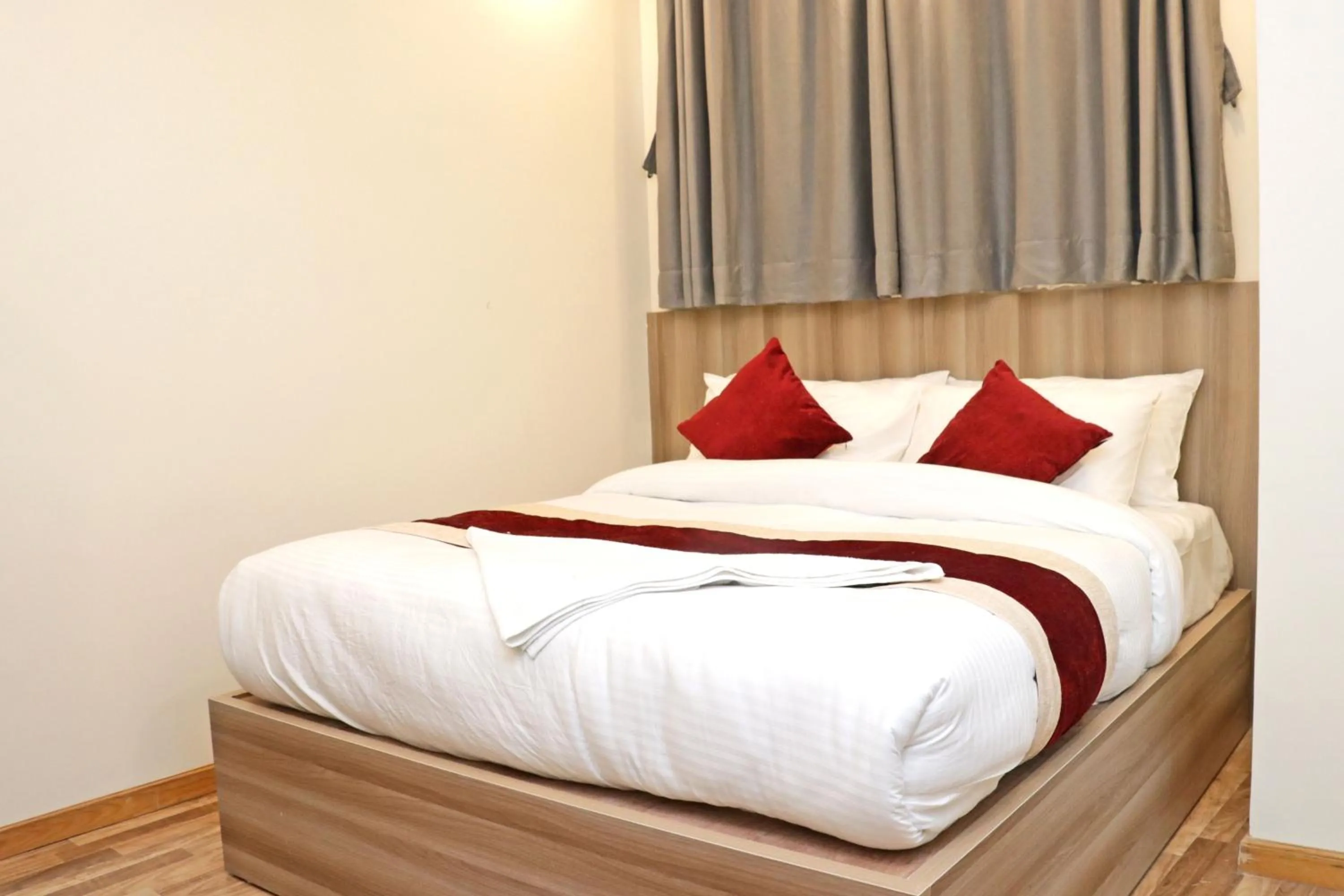 Bed in Hotel Royal Emperor