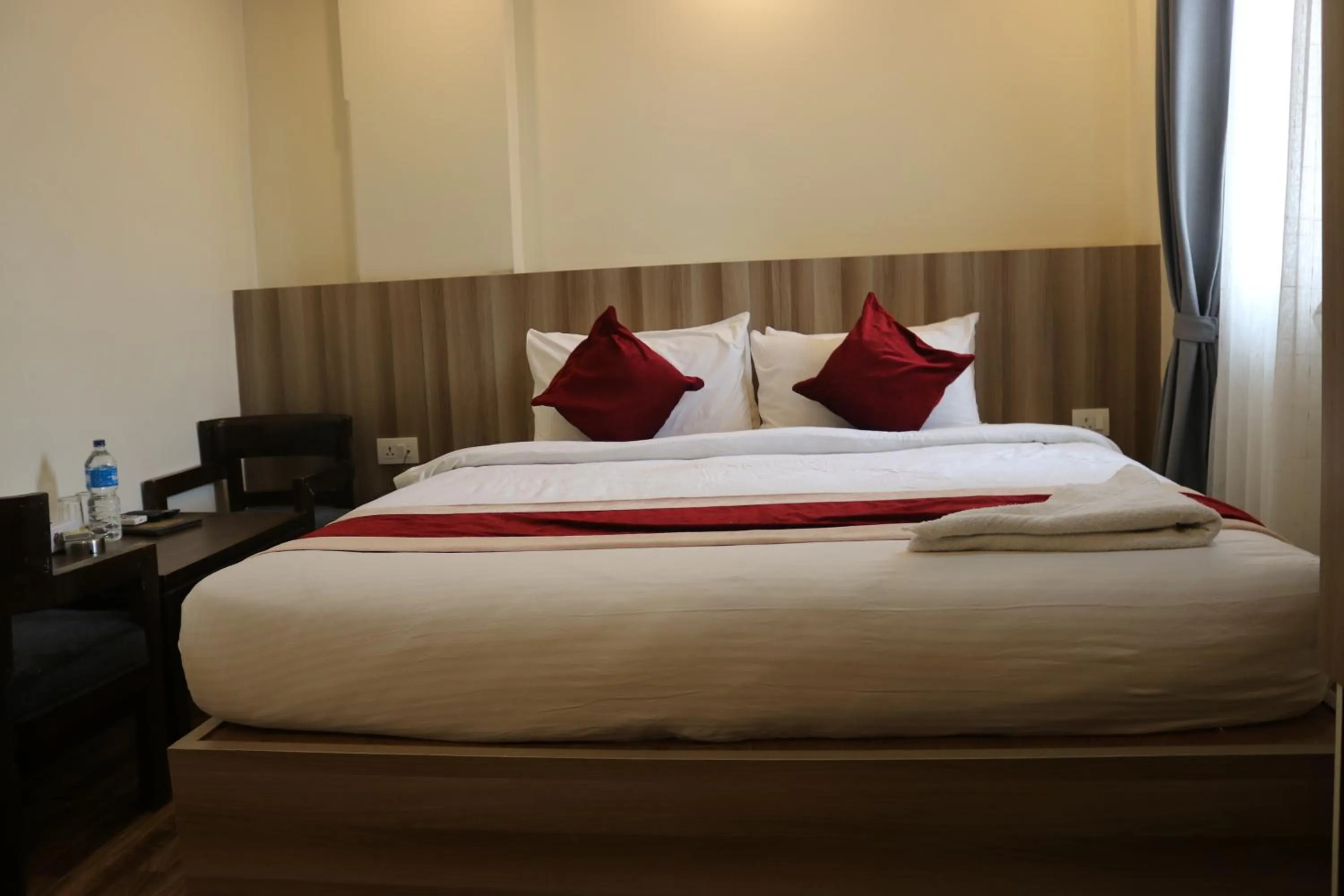 Bed in Hotel Royal Emperor