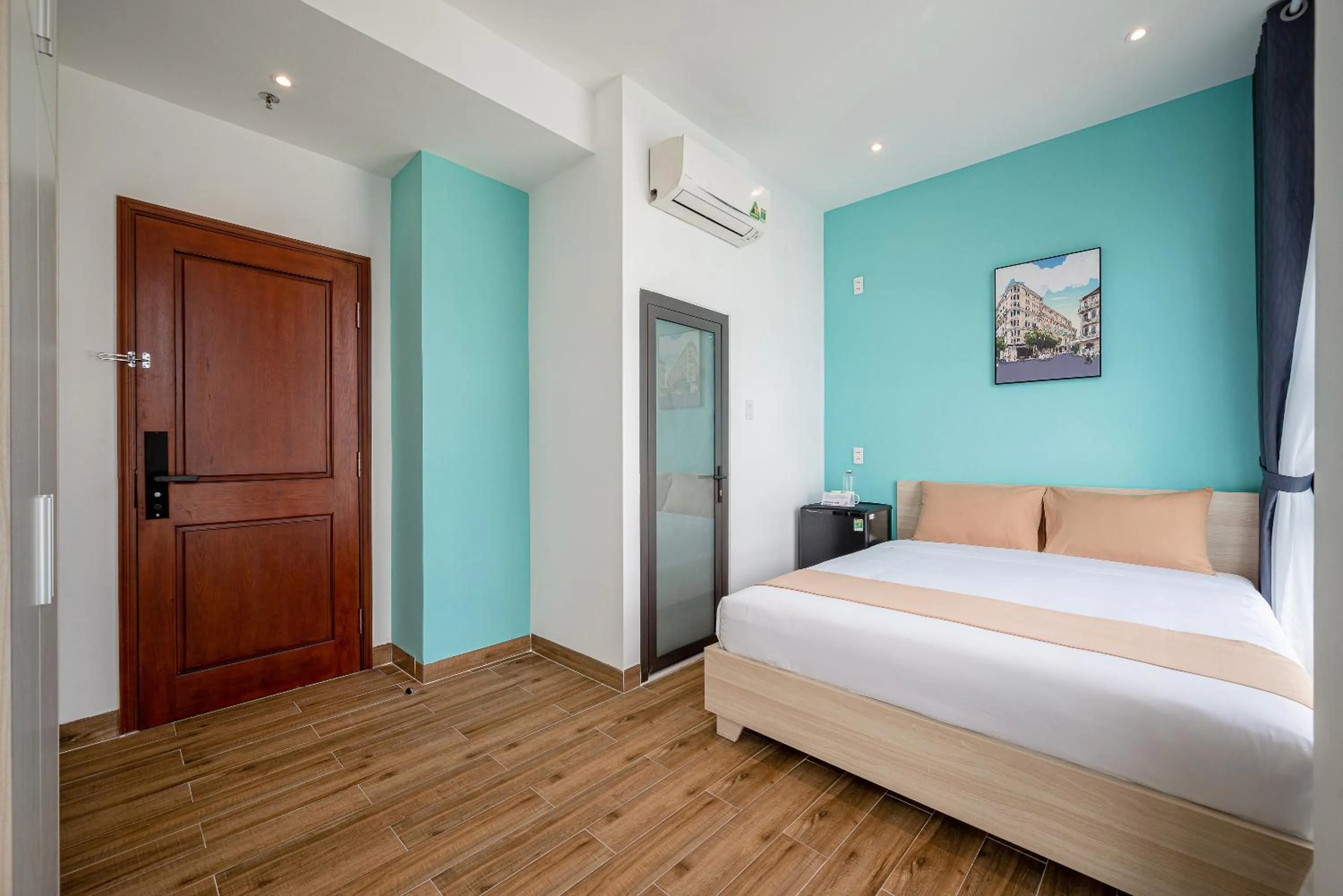 Bed in Cozrum Homes - Cozytel Residence