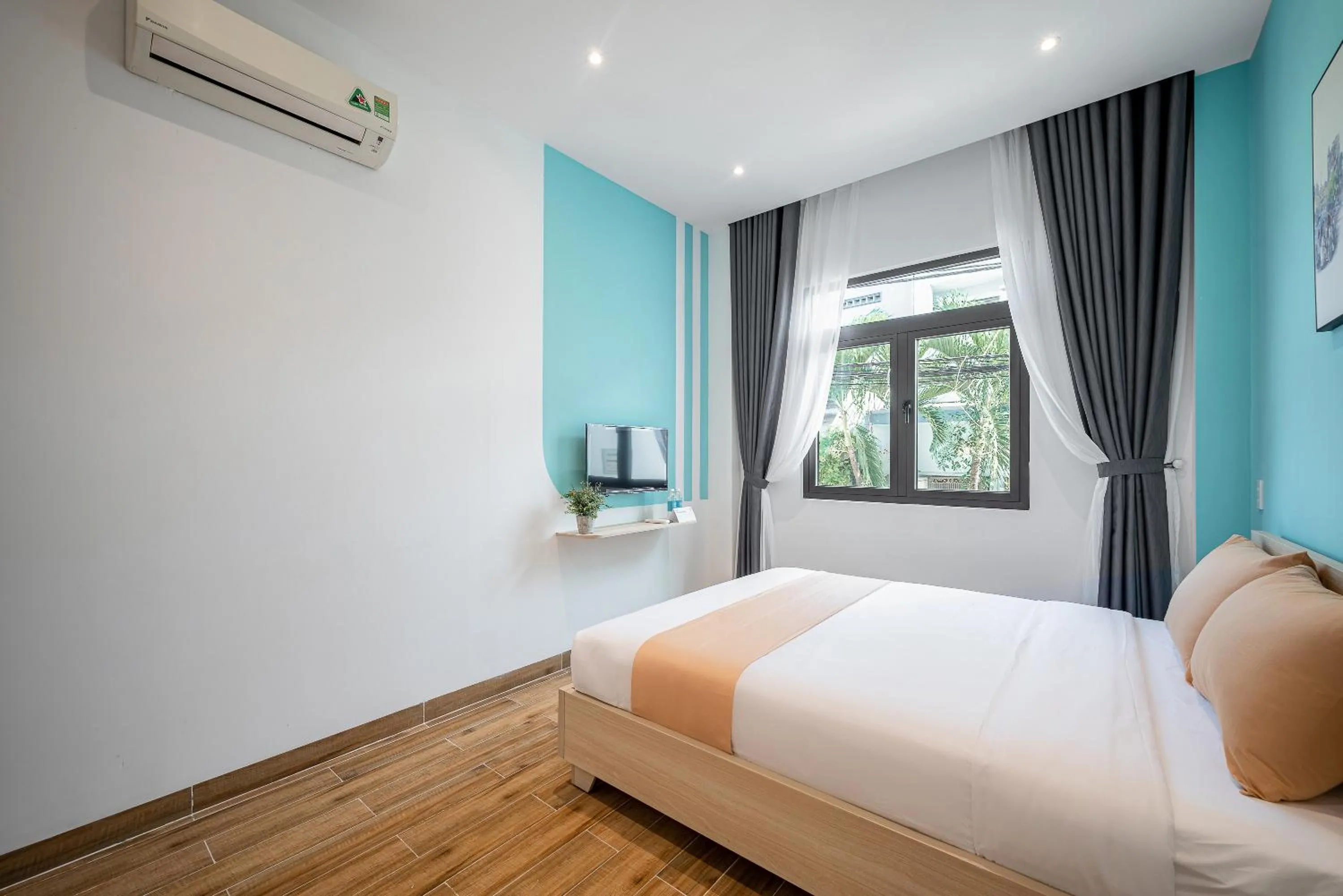 Bed in Cozrum Homes - Cozytel Residence