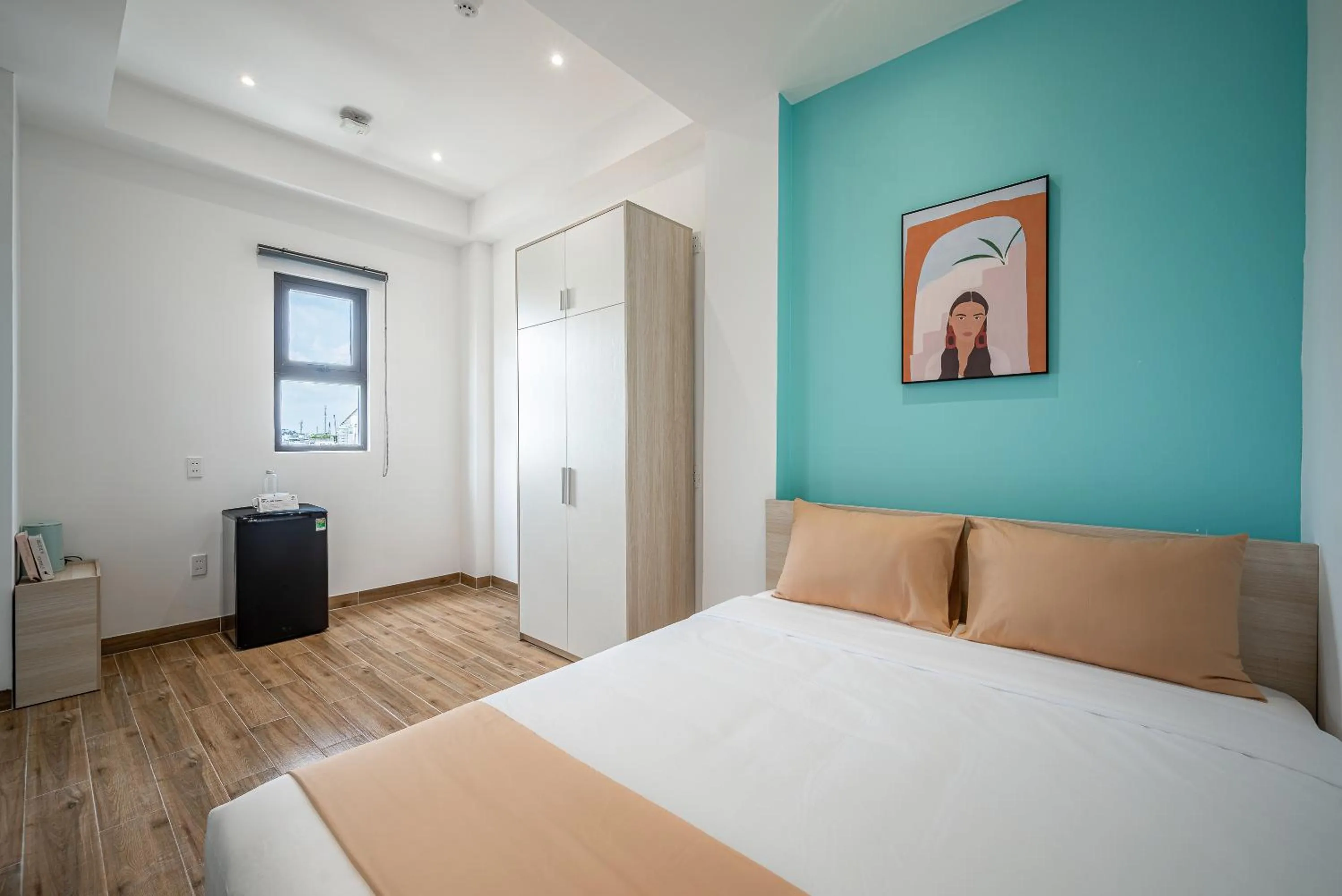 Bed in Cozrum Homes - Cozytel Residence