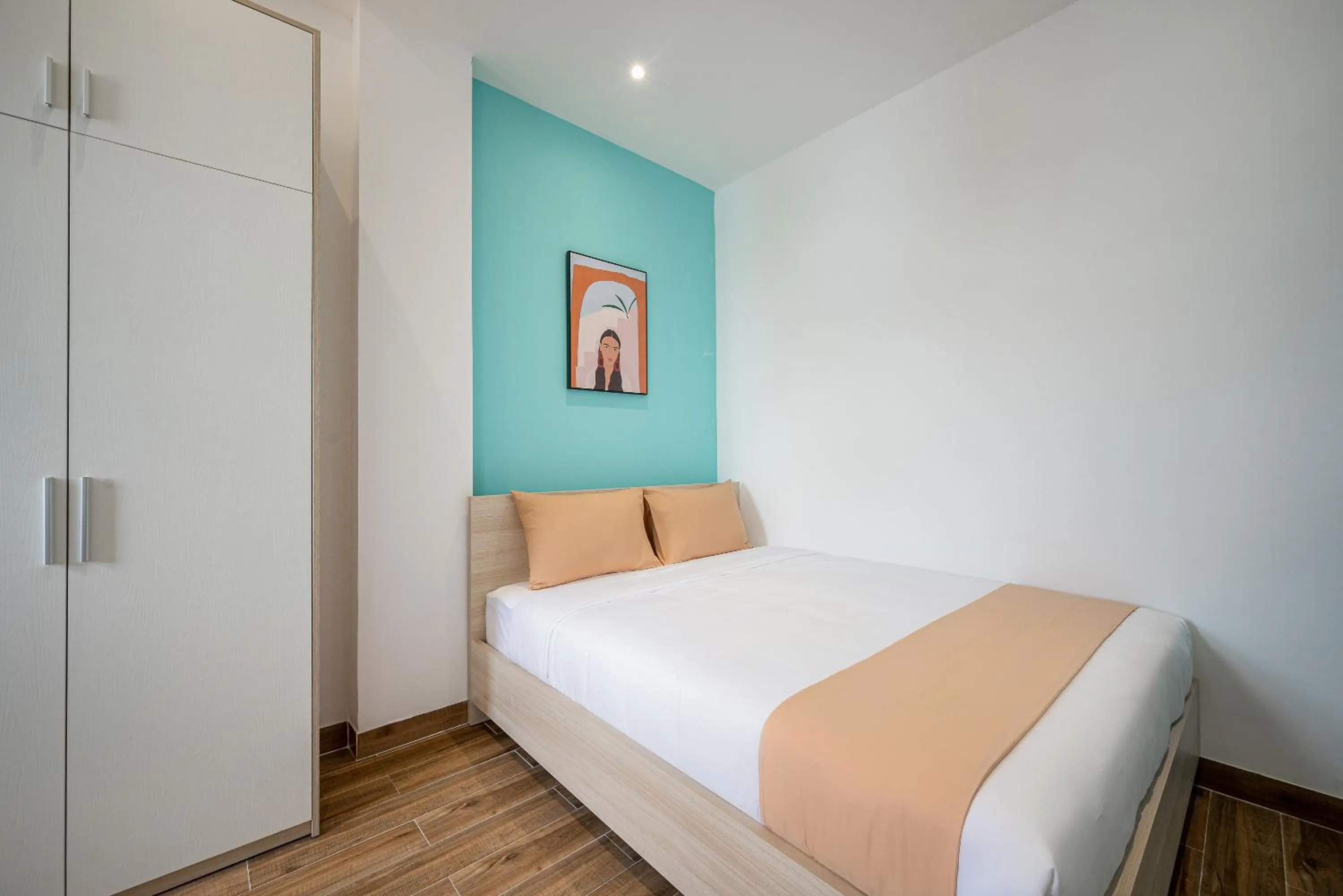 Bed in Cozrum Homes - Cozytel Residence