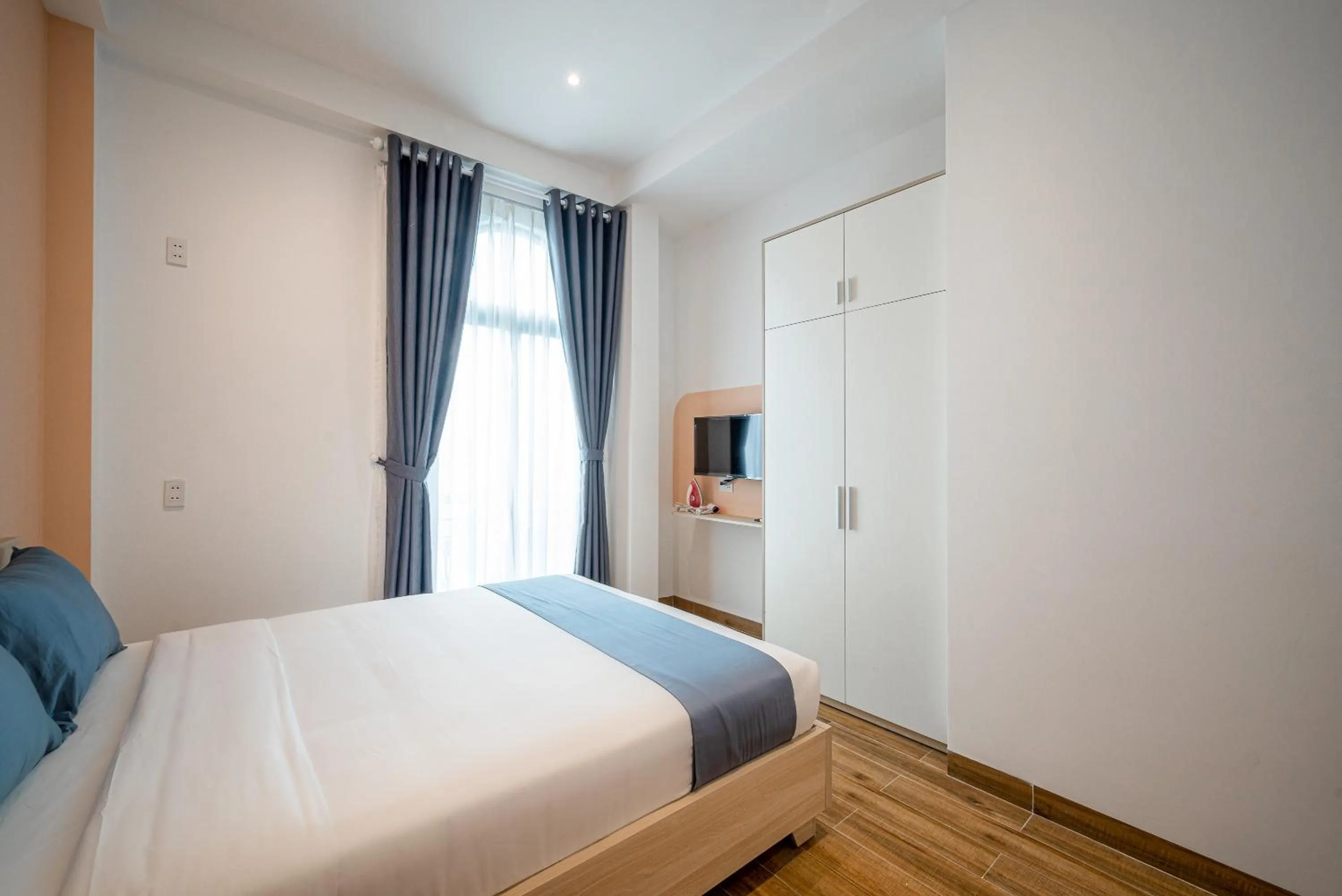 Bed in Cozrum Homes - Cozytel Residence