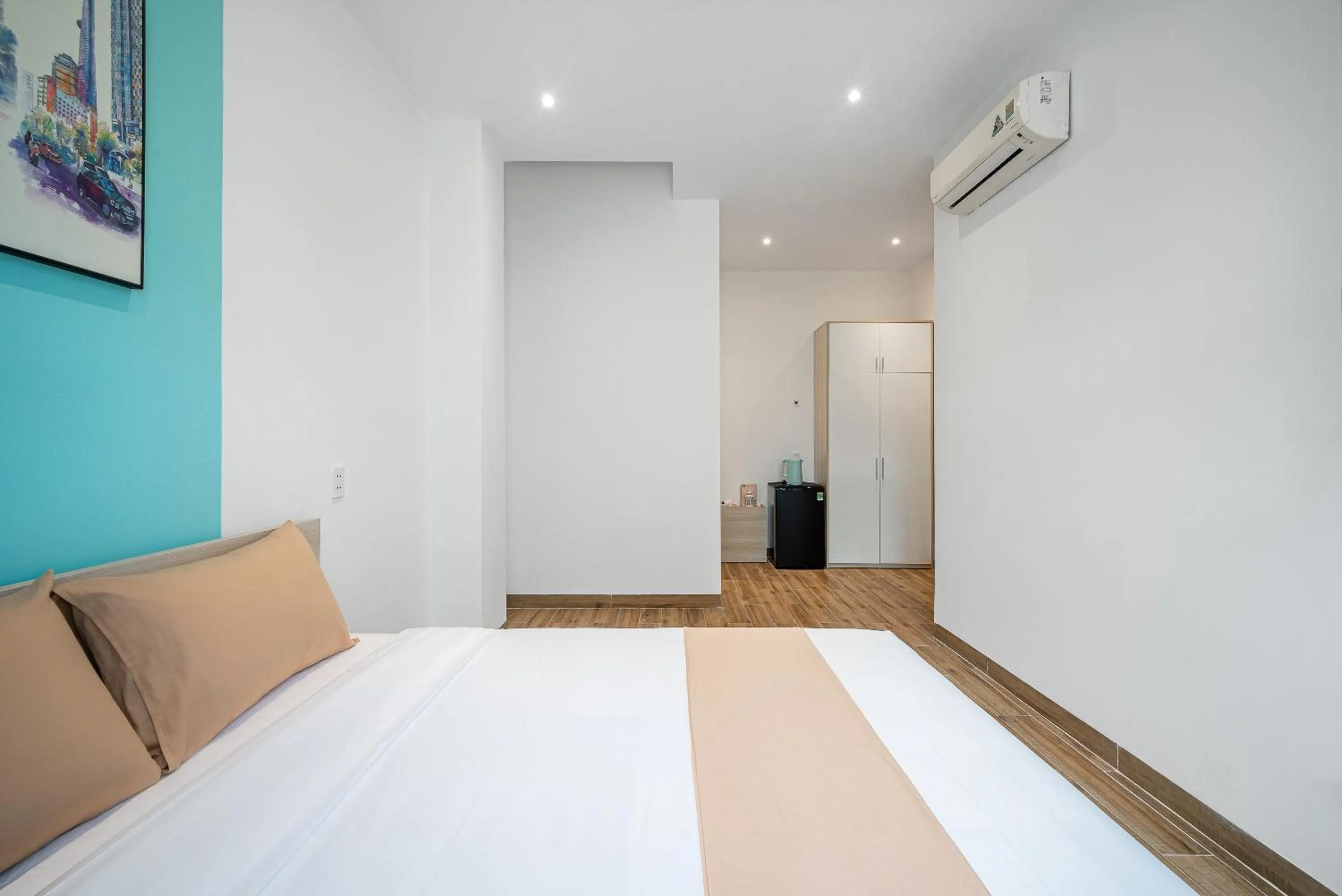 Bed in Cozrum Homes - Cozytel Residence