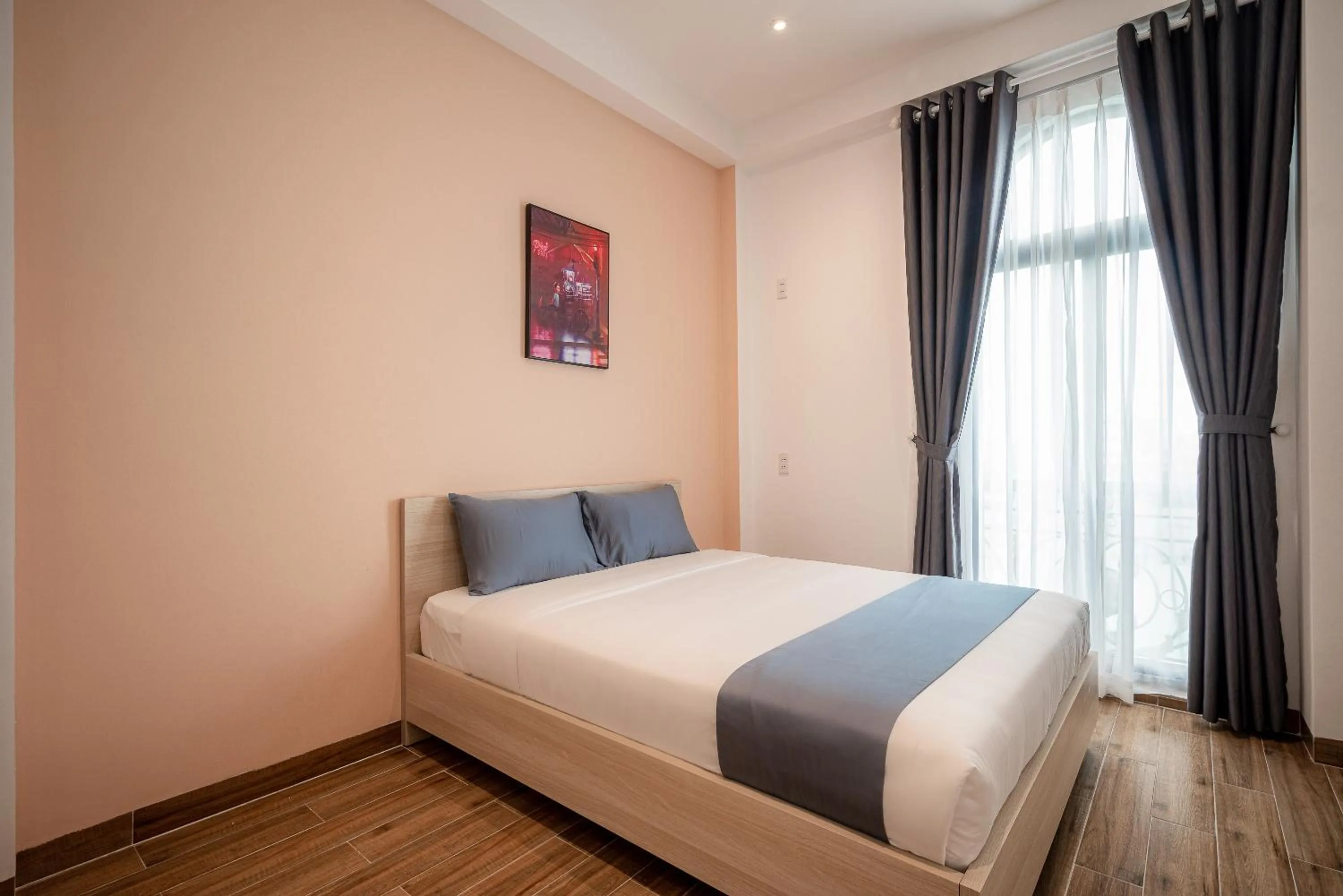 Bed in Cozrum Homes - Cozytel Residence