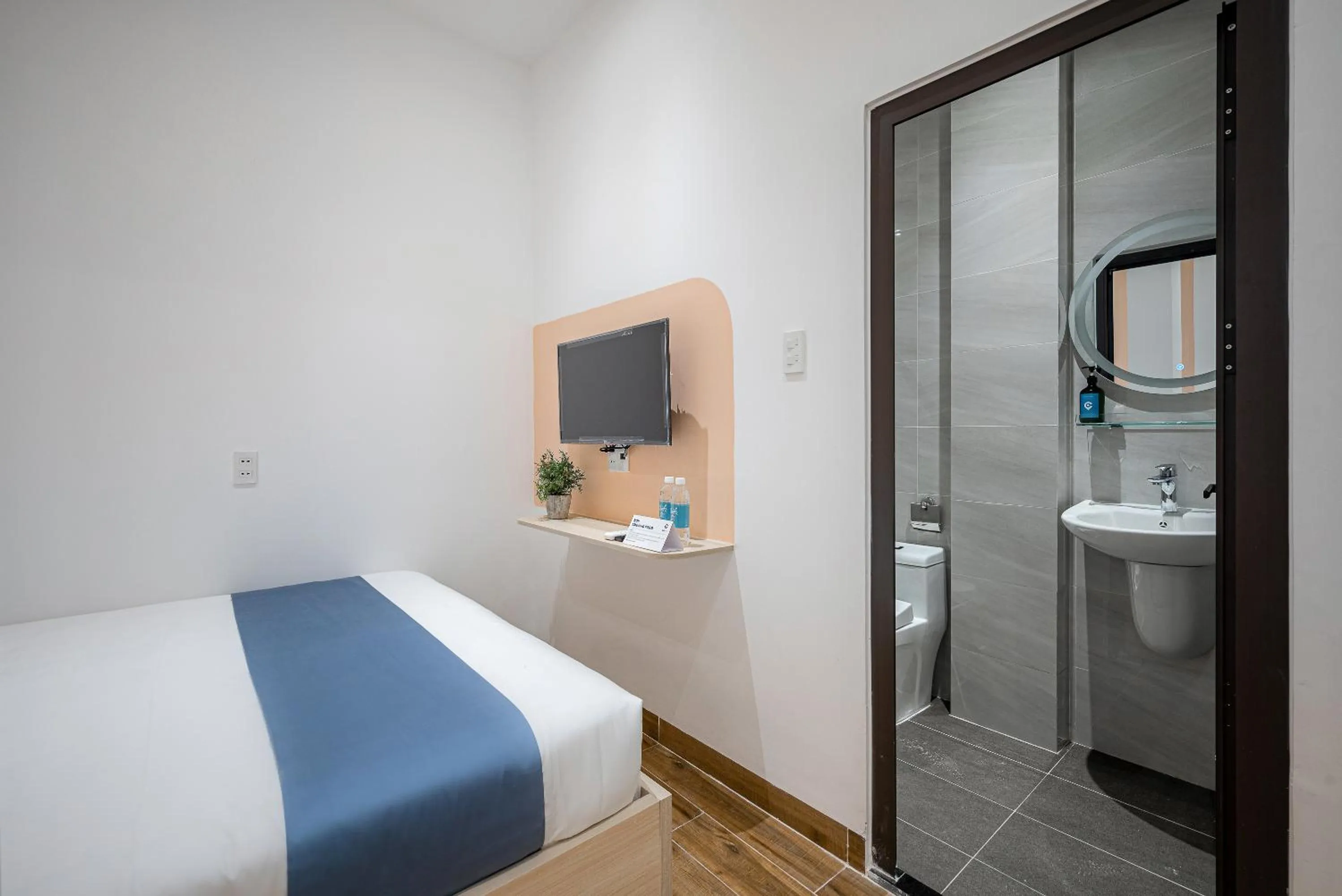 Bed in Cozrum Homes - Cozytel Residence