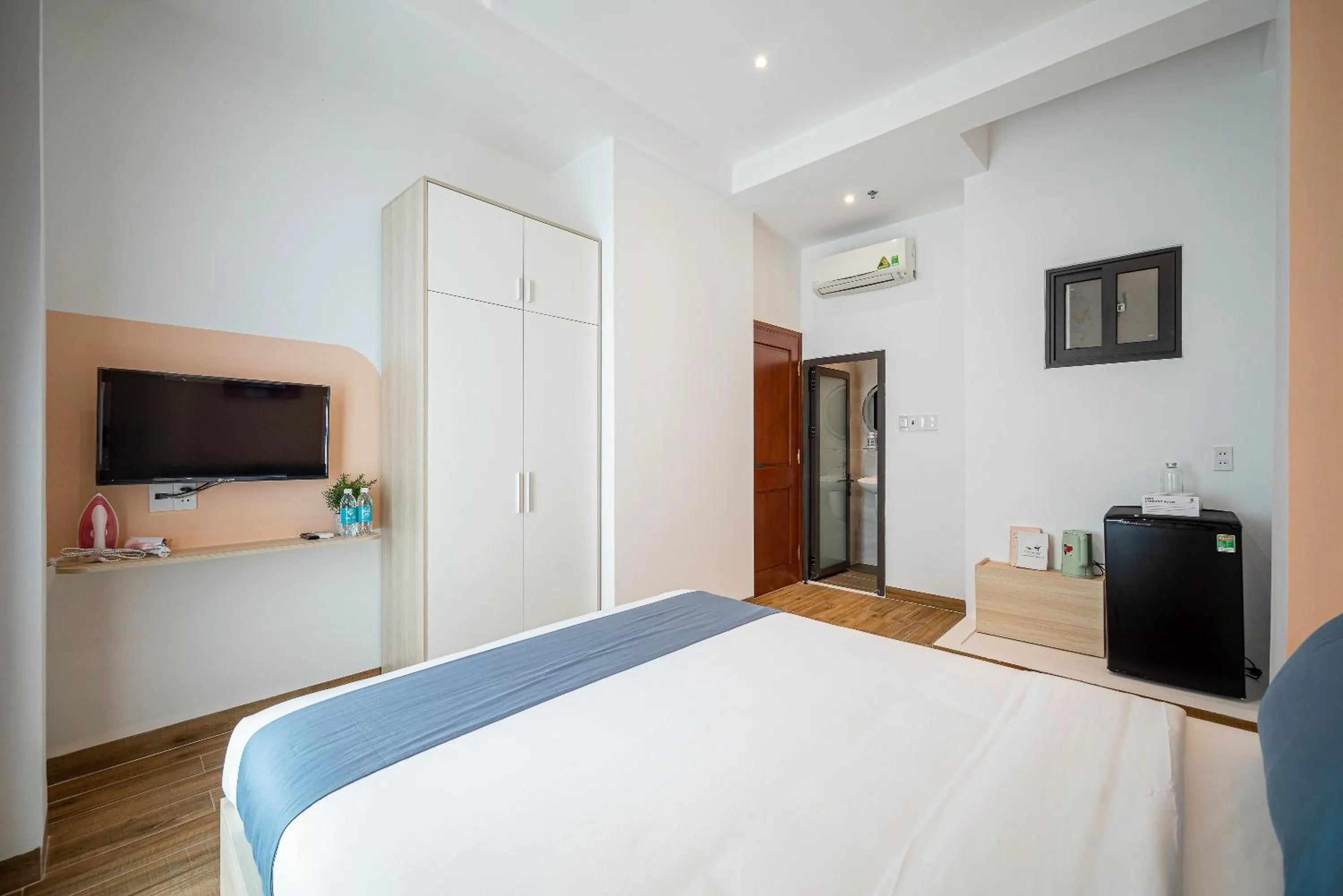 Bed in Cozrum Homes - Cozytel Residence