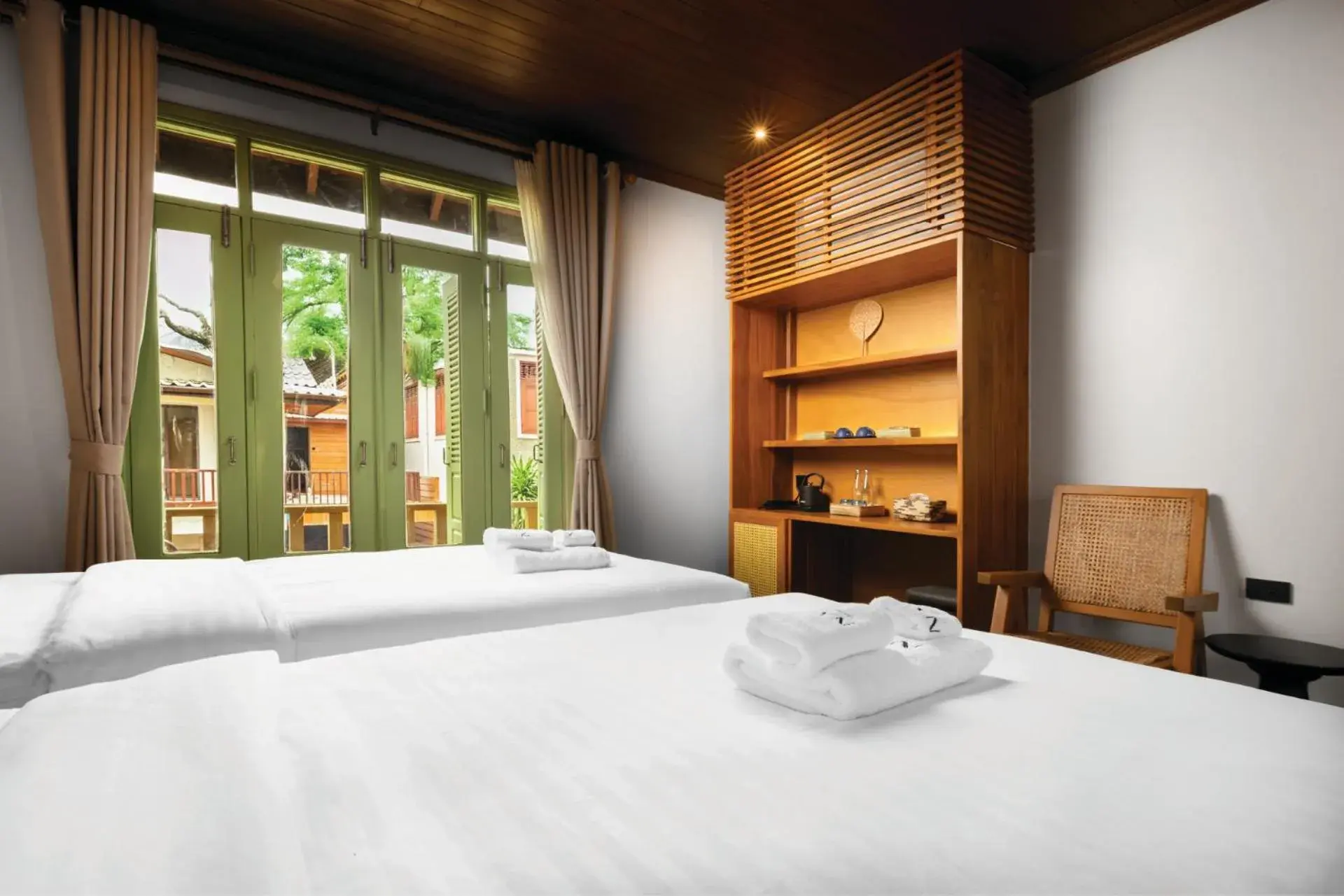 Deluxe Double Room with Balcony in Nava Luang Prabang Hotel Deluxe Double Room with Balcony in Nava Luang Prabang Hotel