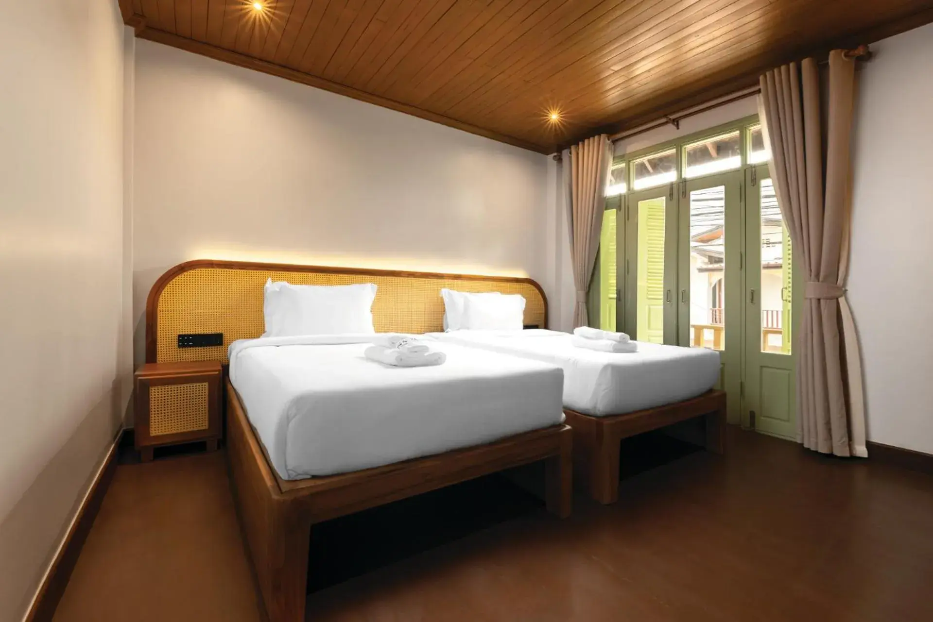 Deluxe Double Room with Balcony in Nava Luang Prabang Hotel Deluxe Double Room with Balcony in Nava Luang Prabang Hotel