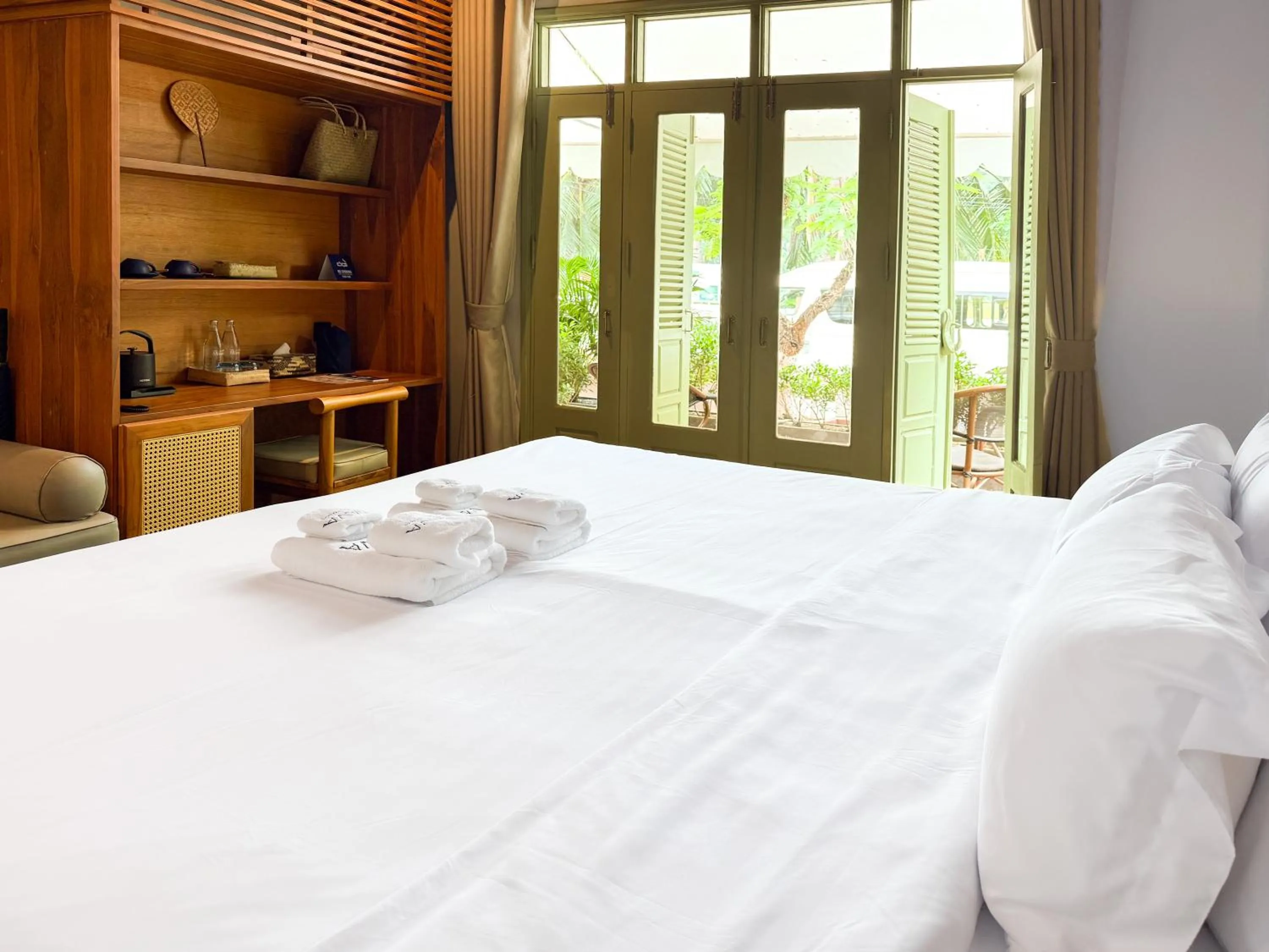Bed in Nava Luang Prabang Hotel