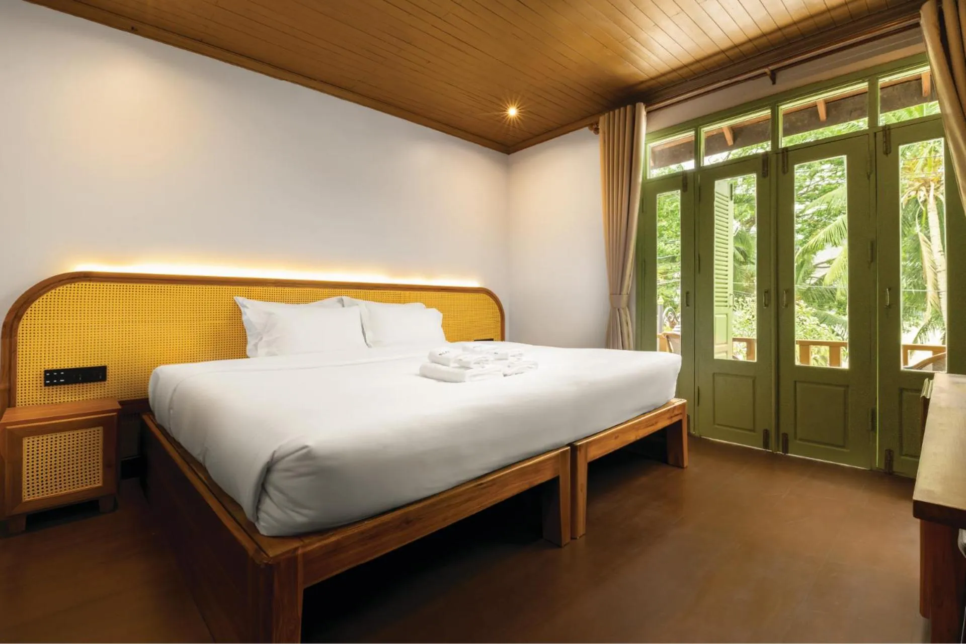 Bed in Nava Luang Prabang Hotel