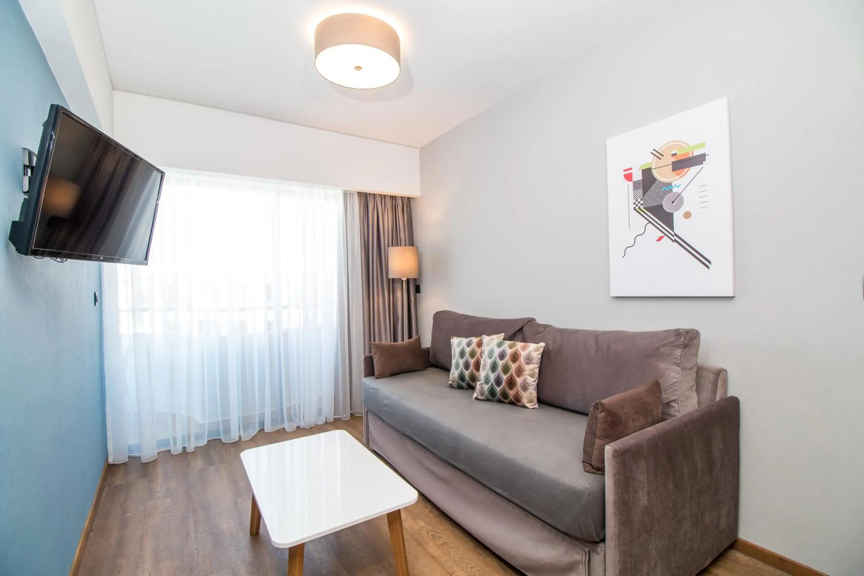 TV and multimedia in Sunny Days Hotel