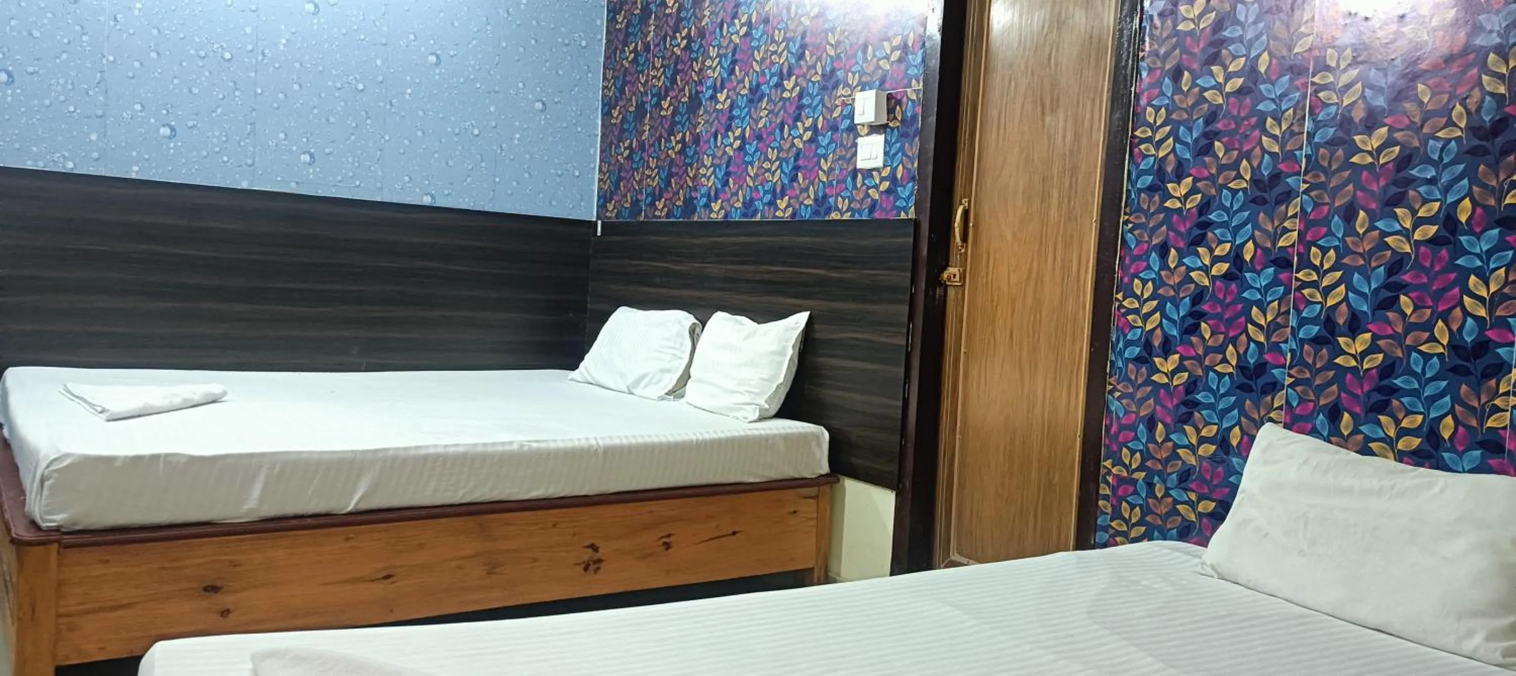 Bed in Kusum Hotel