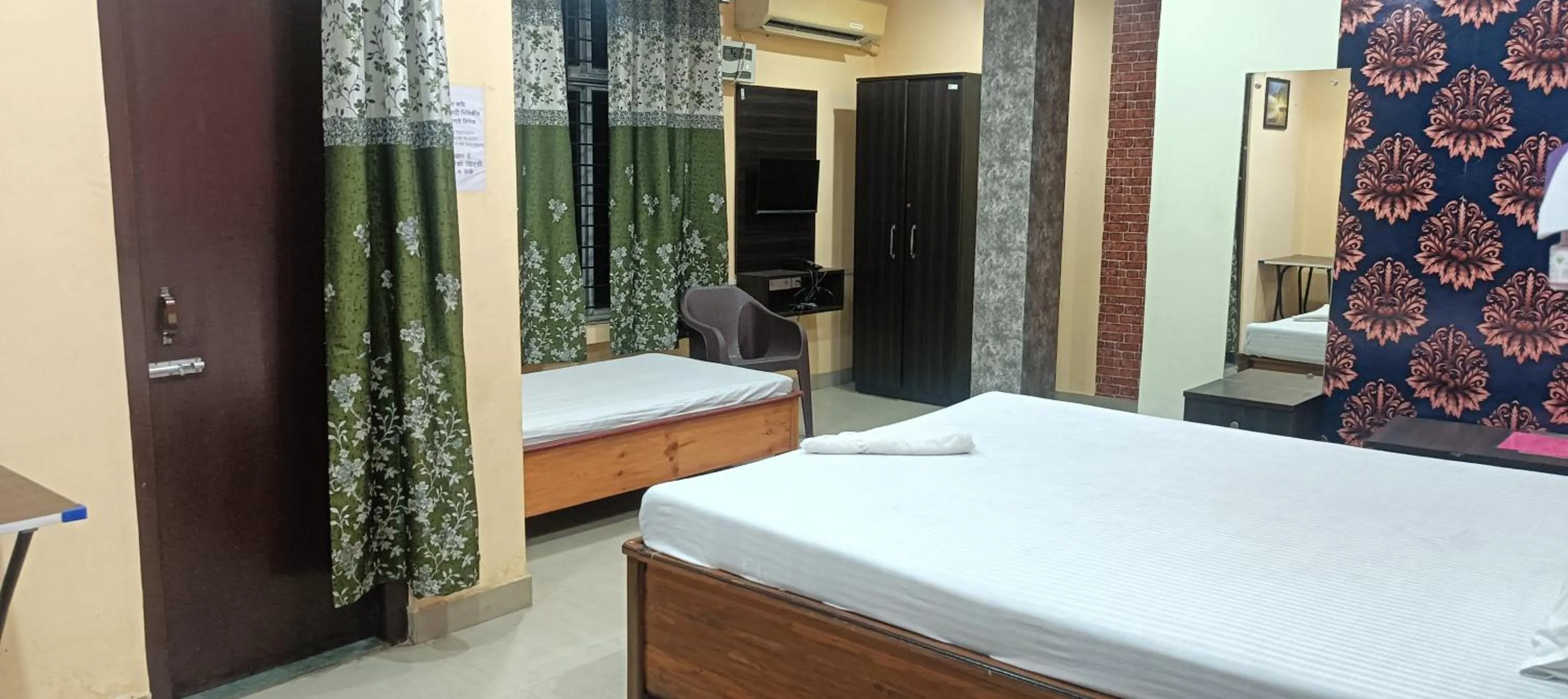 Bed in Kusum Hotel