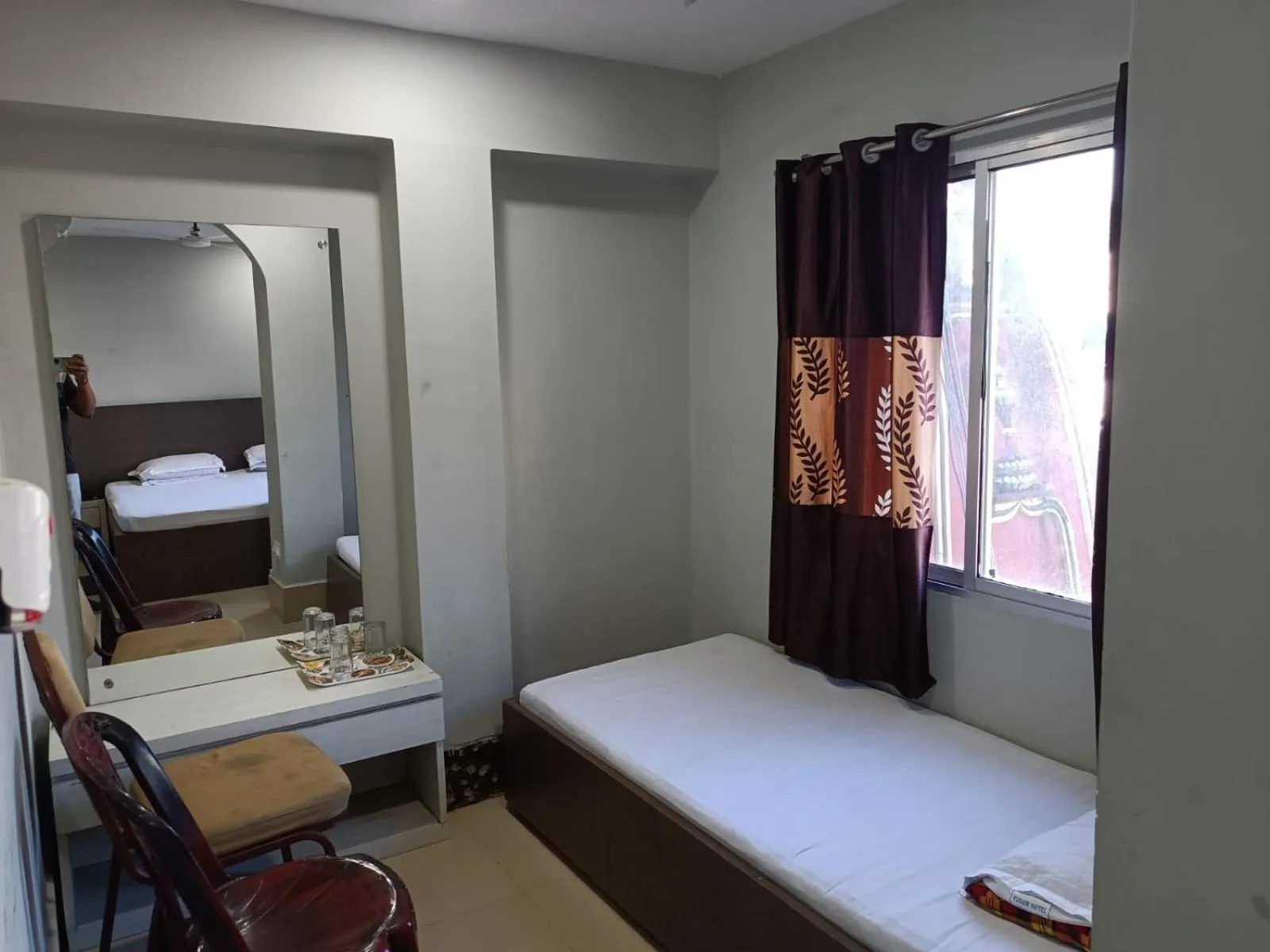 Photo of the whole room, Bed in Kusum Hotel