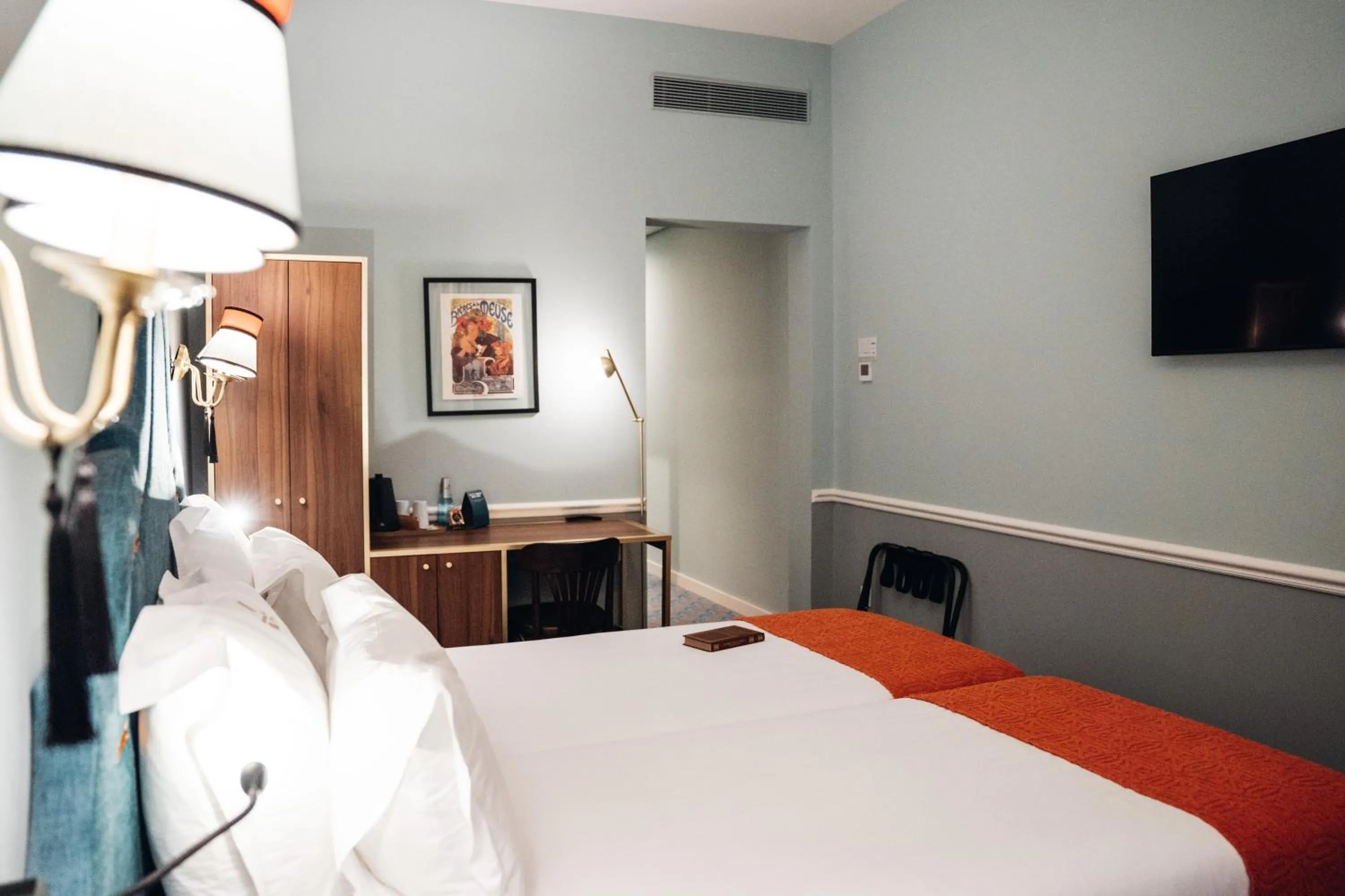 Bed in GRANDE HOTEL PARIS by STAY HOTELS