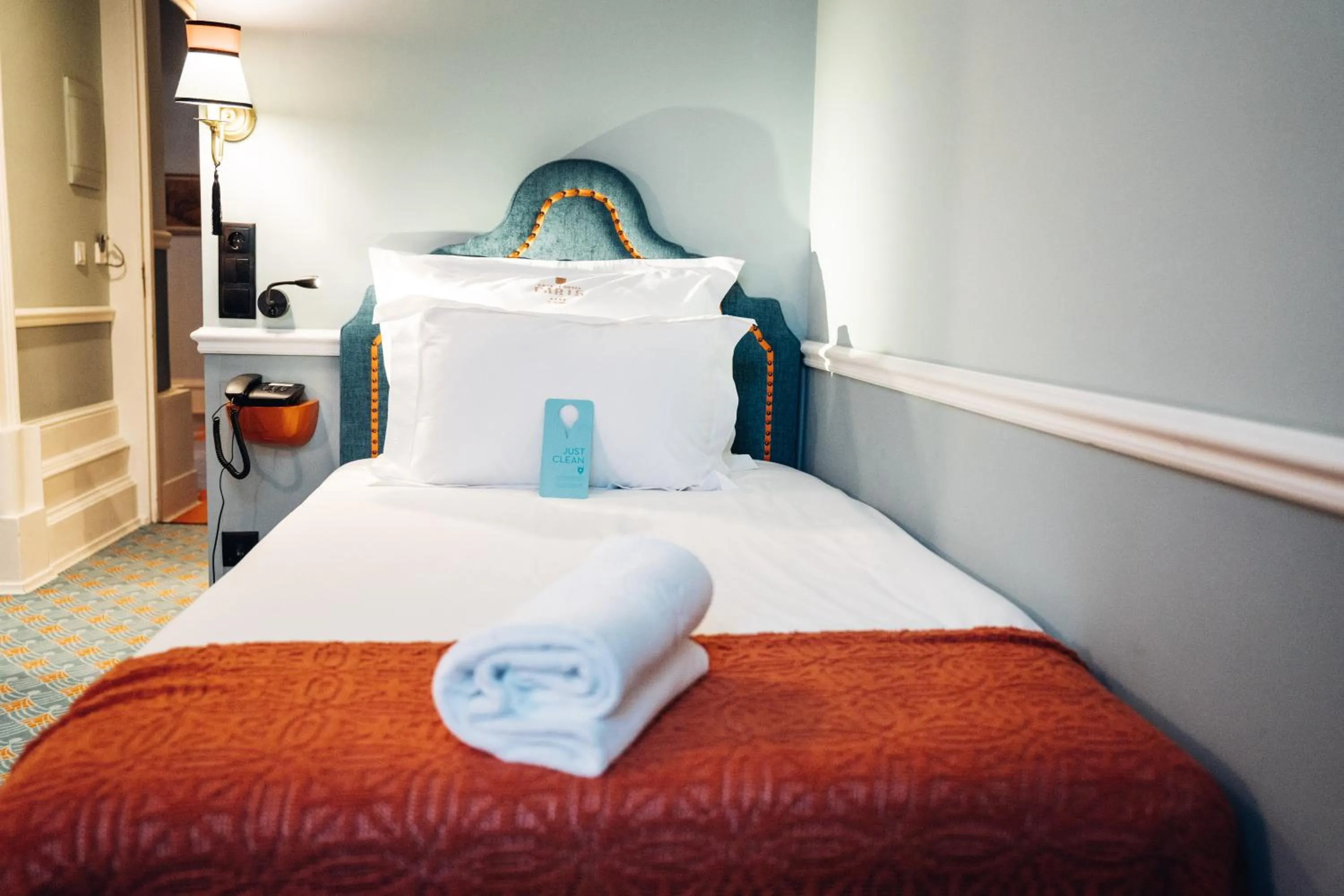 Bed in GRANDE HOTEL PARIS by STAY HOTELS