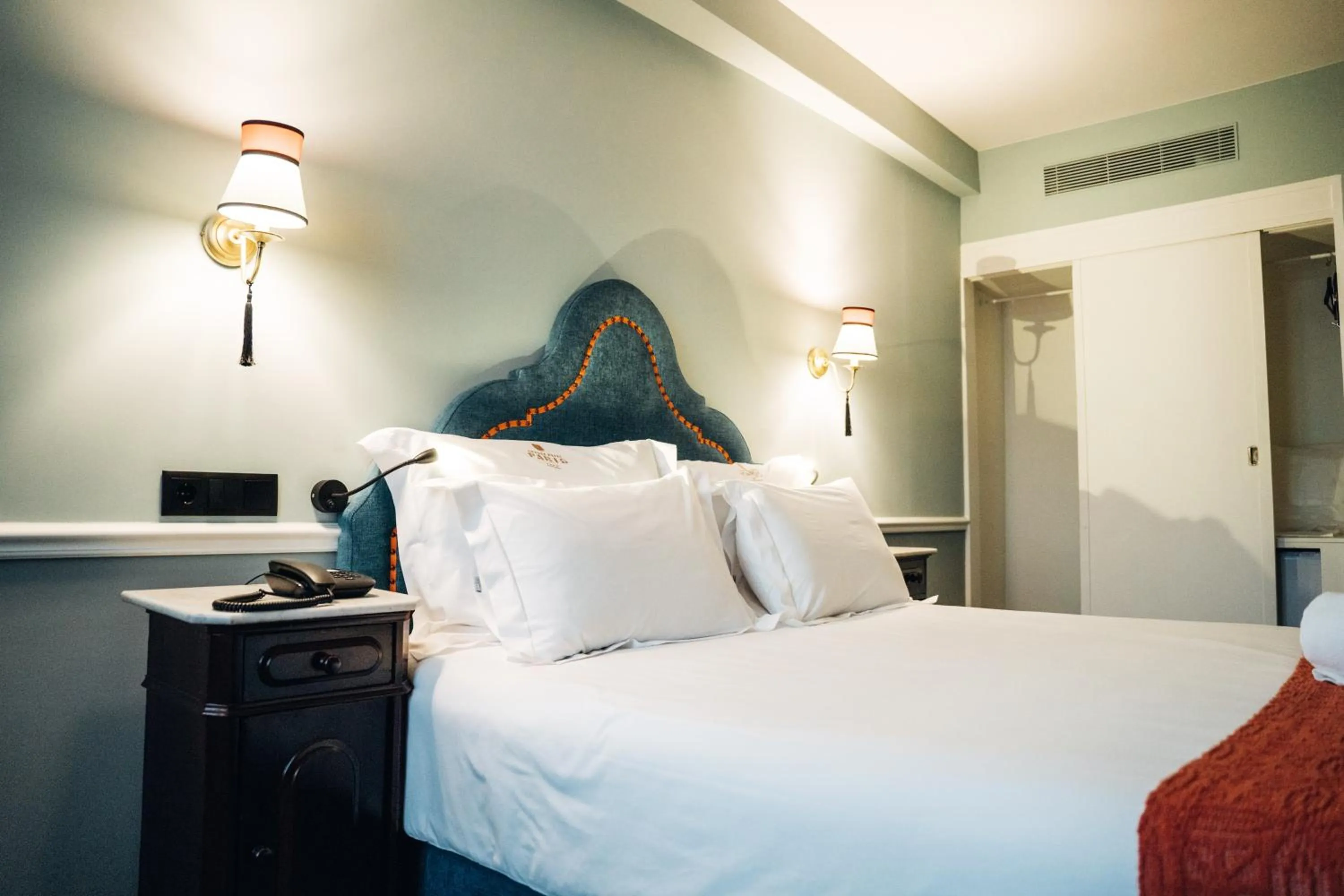 Bed in GRANDE HOTEL PARIS by STAY HOTELS