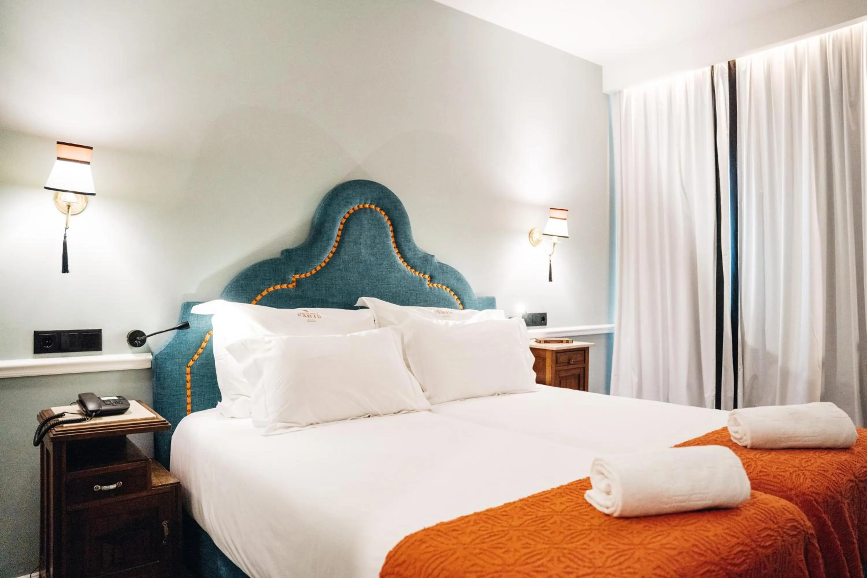 Bed in GRANDE HOTEL PARIS by STAY HOTELS