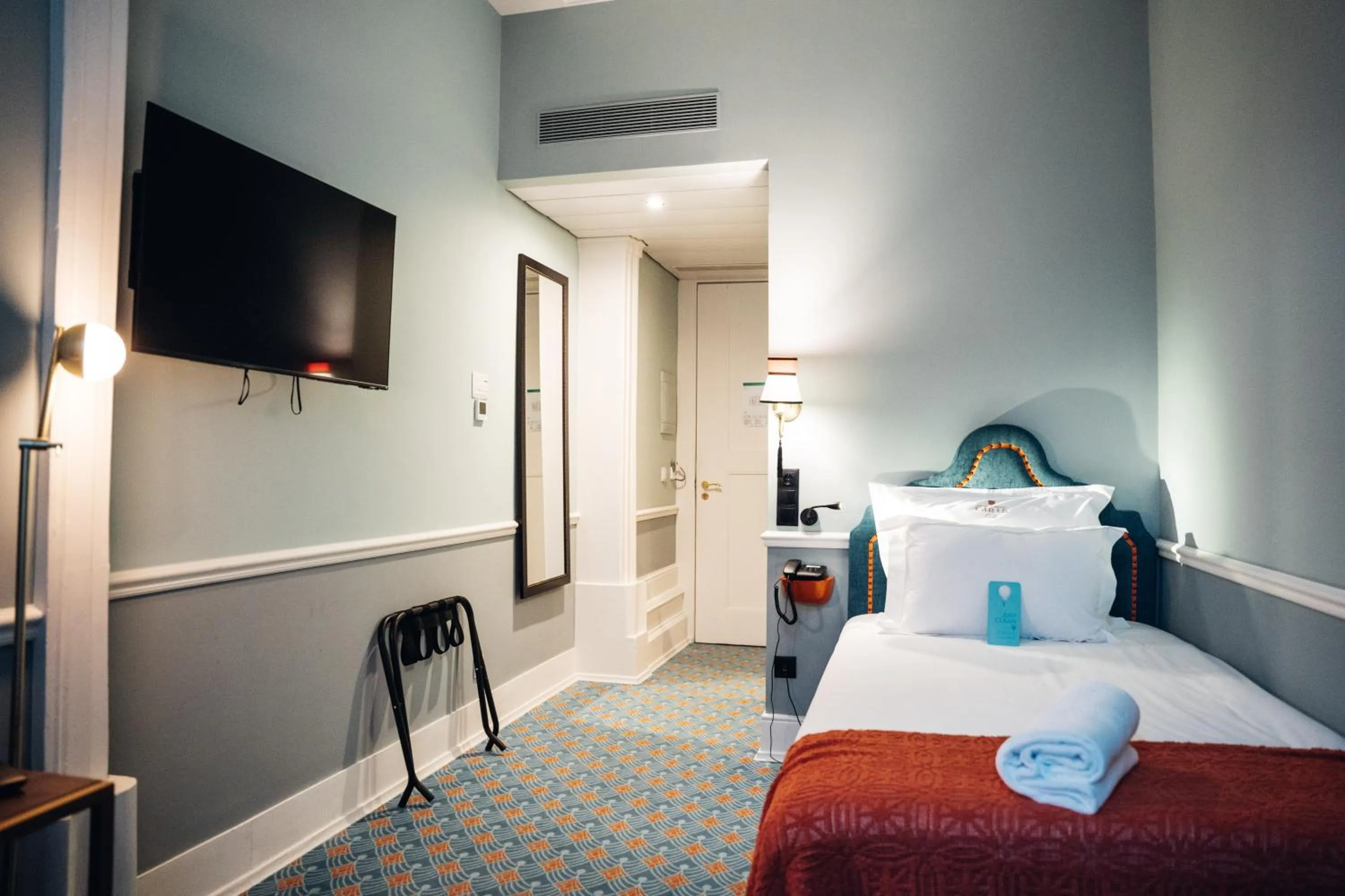 Bed in GRANDE HOTEL PARIS by STAY HOTELS