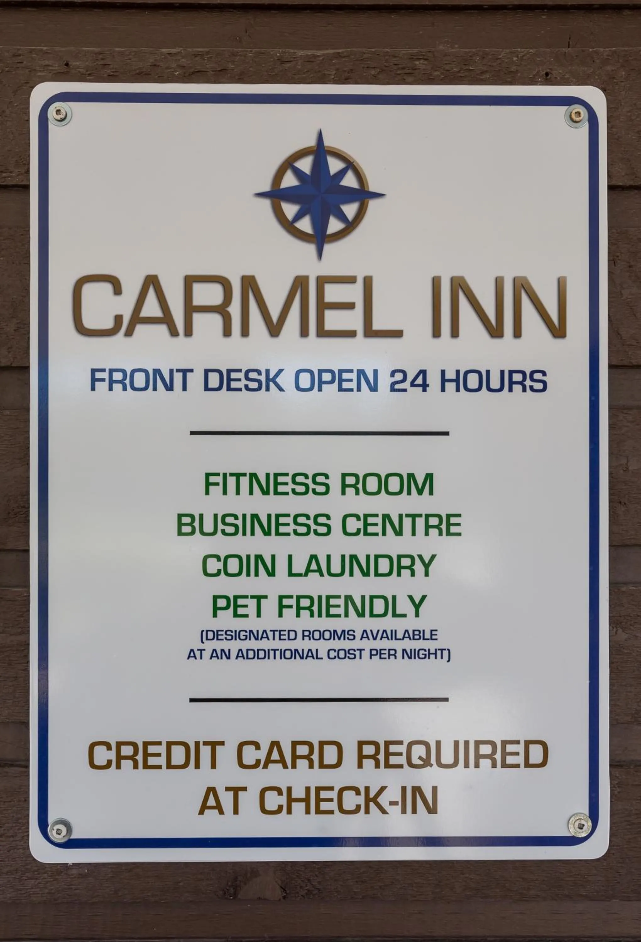 Property logo or sign in Carmel Inn